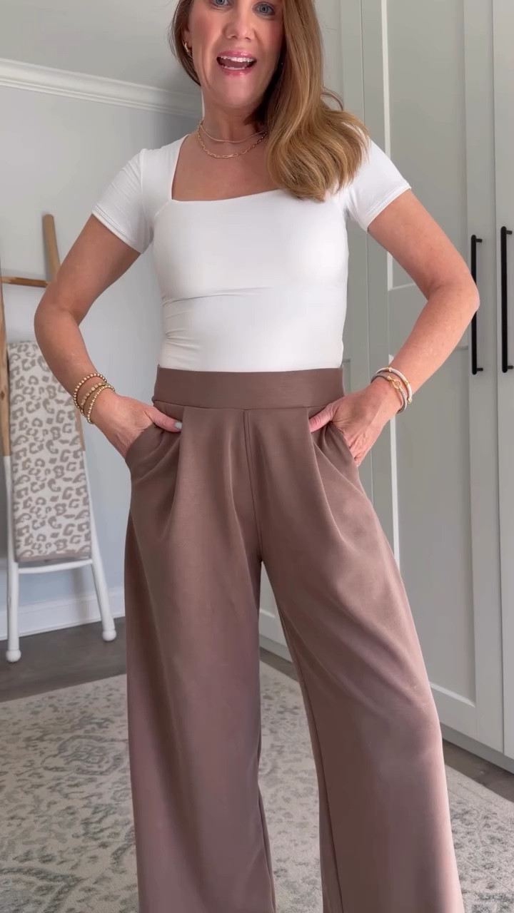 Swap your leggings for these super soft and comfy wide leg trousers that are nearly identical to the Lulu align wide leg pants. But these… Are better.🤌🏼 They have an ultra flattering and stretchy band at the waist, pockets, a flattering pleating detail, the same seam on the back as the Lulu aligns and this pair is 55% modal while the Lulu are over 80% polyester with no modal. They are also super versatile and can be styled for work, play, lounge, or travel.

chic and comfortable travel outfit, Amazon fashion find, leggings alternative, what to wear over 40, how to style, comfortable and flattering workwear, viral wide leg, pants, tall girl style

#LTKgrwm #LTKActive #LTKOver40