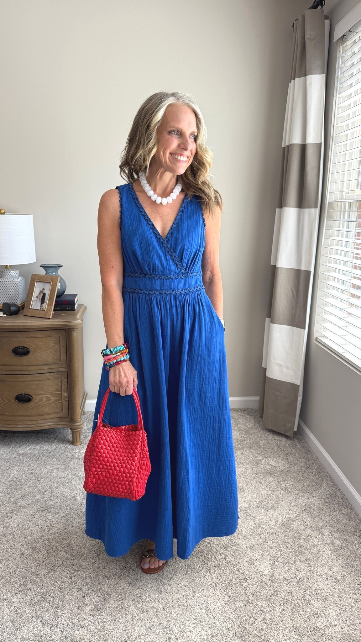 If you love gauze, you will love this dress!!! The pop of red is the perfect accent and the bag is a great size. Holds just enough

#LTKootd #LTKgrwm #LTKOver40