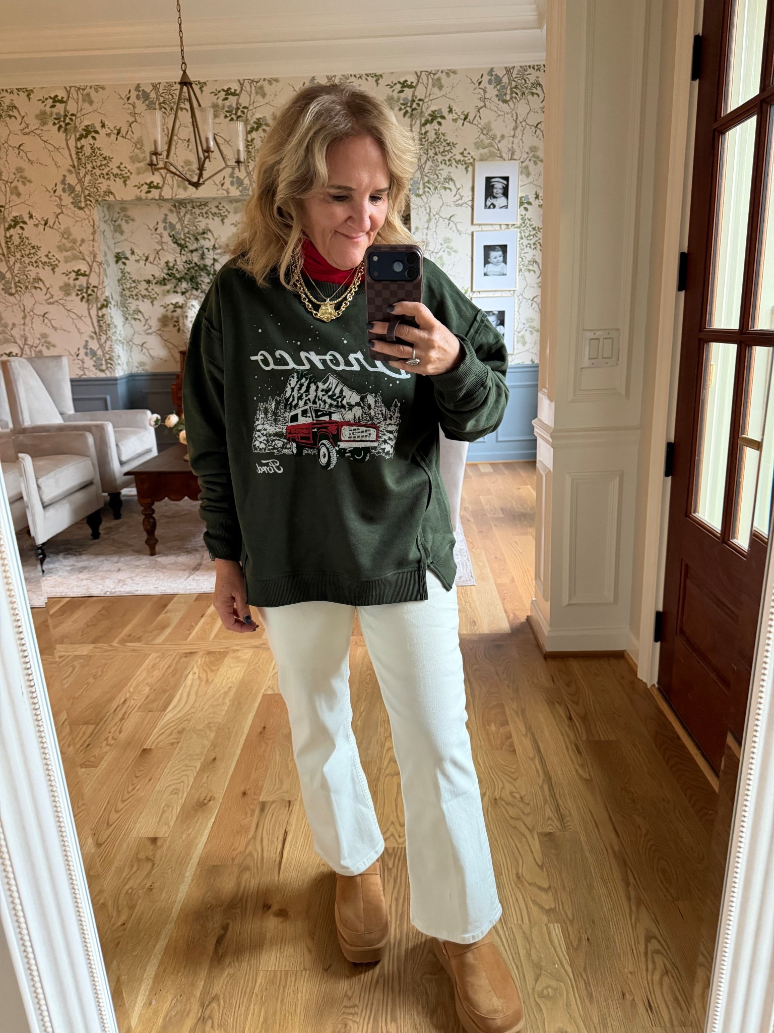 Walmart bronco sweatshirt size medium 
Turtleneck size medium
Spanx ecru jeans I sized up 2 sizes to a 12!!! 

#LTKOver40 #LTKHoliday #LTKFindsUnder100