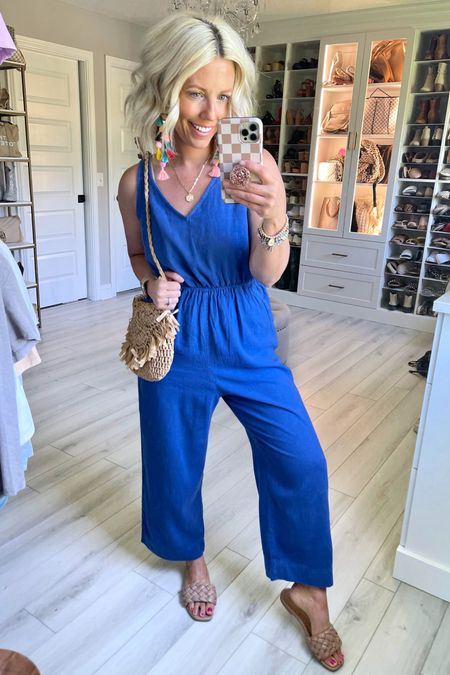 I love this linen jumpsuit paired with some fun earrings!!! It has a fun cutout in the pack, pockets, and you can wear a normal bra! Wearing my true size small. Slides sized up 1/2 size!

#LTKunder50 #LTKunder100 #LTKsalealert