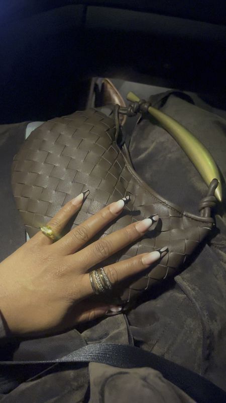 This leather woven handbag has great hardware and packs a punch in size.
Also i never leave home without a pinky ring. 

#LTKfindsunder50 #LTKstyletip #LTKfindsunder100