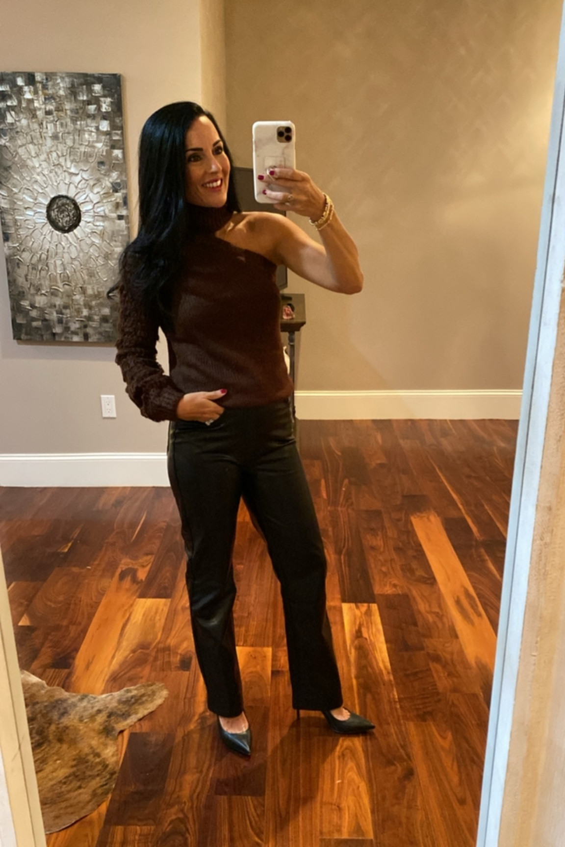 One shoulder sweater with faux leather pants 

#LTKstyletip #LTKunder100 #LTKHoliday