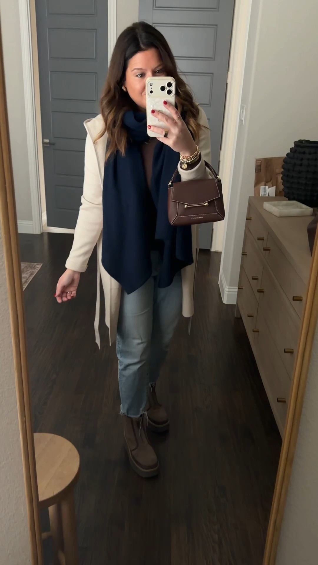OOTD. I love a good layered, casual, but still put together look, and this one is so versatile. A simple hooded cardigan with some jeans, a gorgeous Strathberry bag (of course, bc yall know my love for them runs DEEP) and some incredibly comfortable chunky Ugg boots! I could live in this! 

#LTKWorkwear #LTKdayinmylife #LTKmomlife