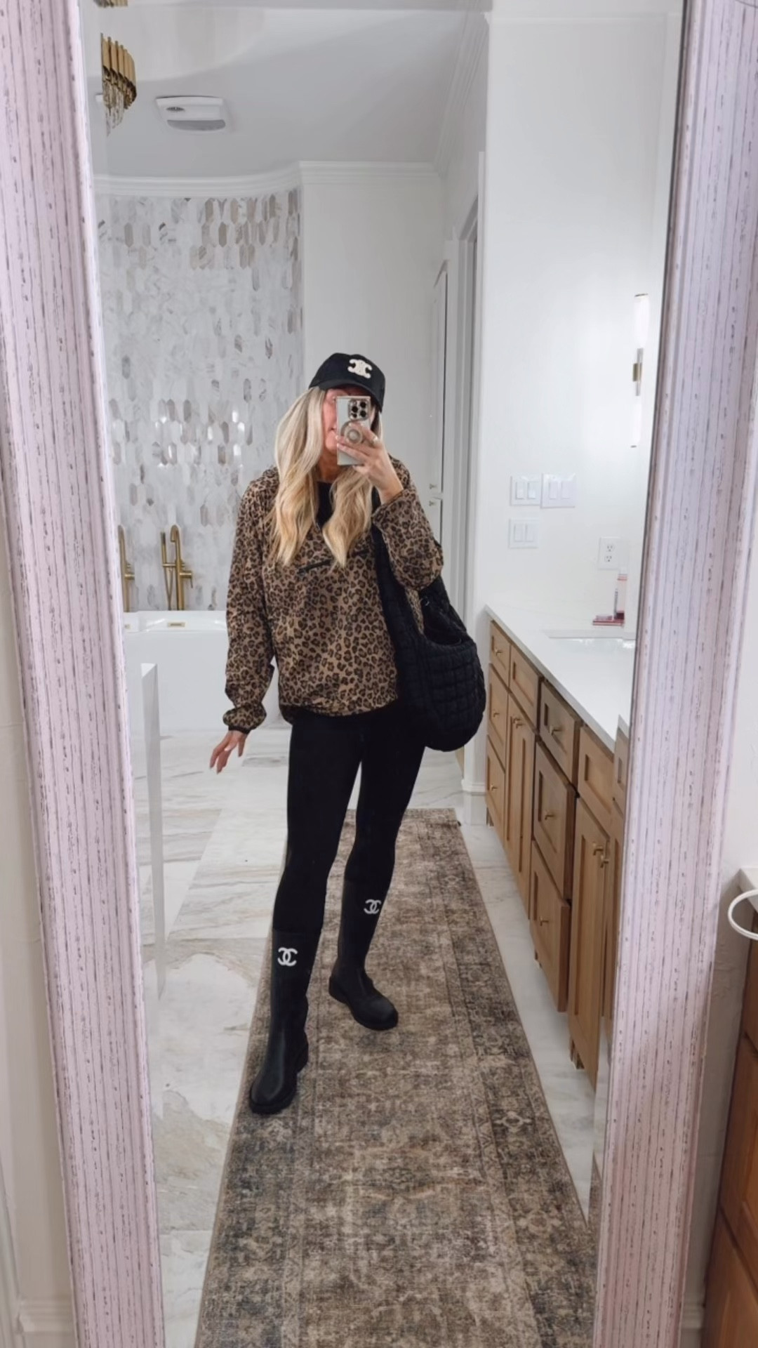Sized up to a large in this leopard lightweight water resistant, wind resistant & UV protection pullover that has a hood. Rainy day outfit. Spring outfits 2026. Sports outfit. Spring outfits 2026. Spring fashion. Easter. Jumpsuit. Romper. Memorial Day weekend. GRWM. Sports mom outfit 

