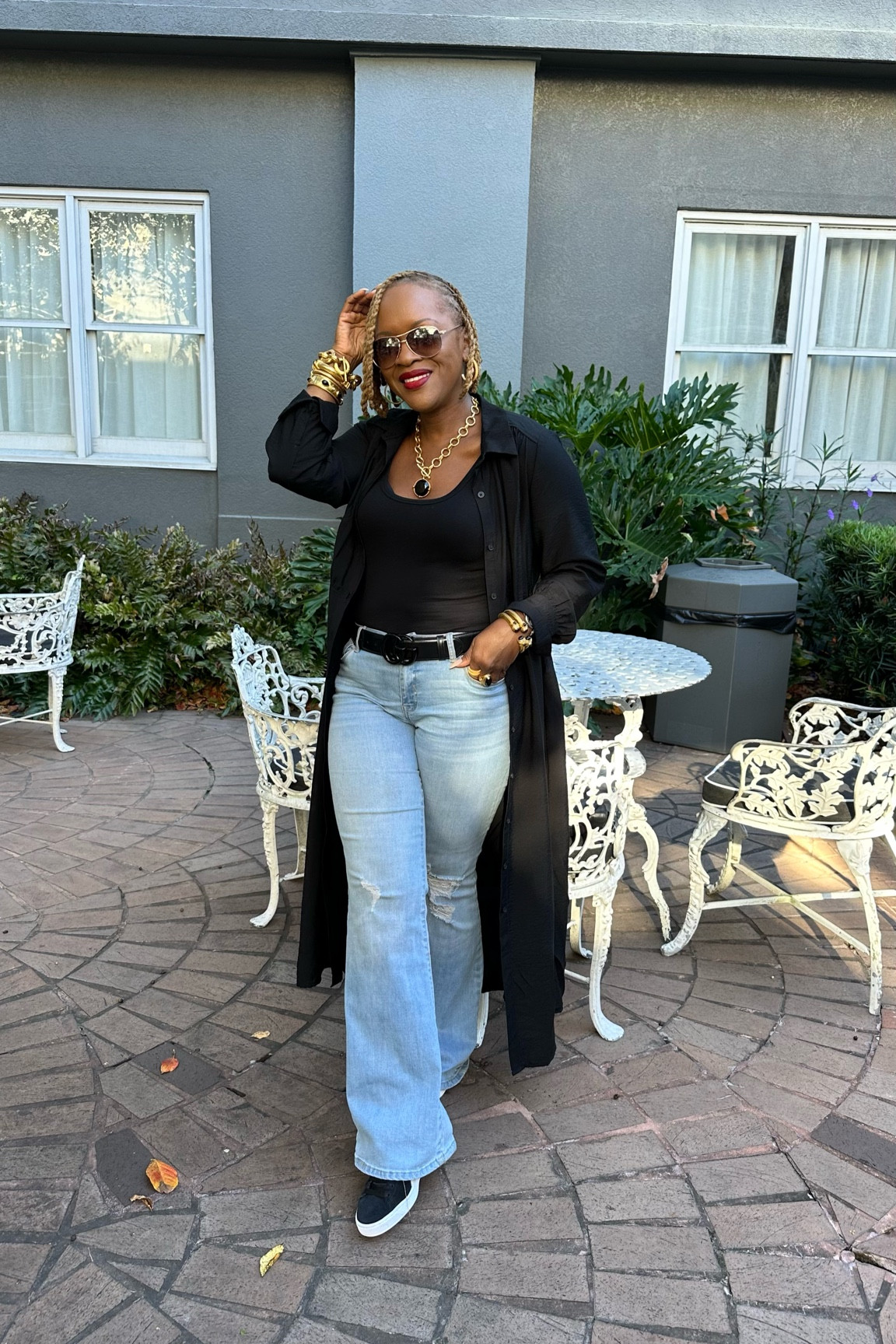 Casual early fall outfit 
Black shirt dress
Distressed wide leg denim 
Puma black and white sneakers 
Black Gucci belt
Julie Vos Gold and black Jewlery 
Red lipstick
Gold aviator sunglasses 

#LTKStyleTip #LTKShoeCrush #LTKOver40