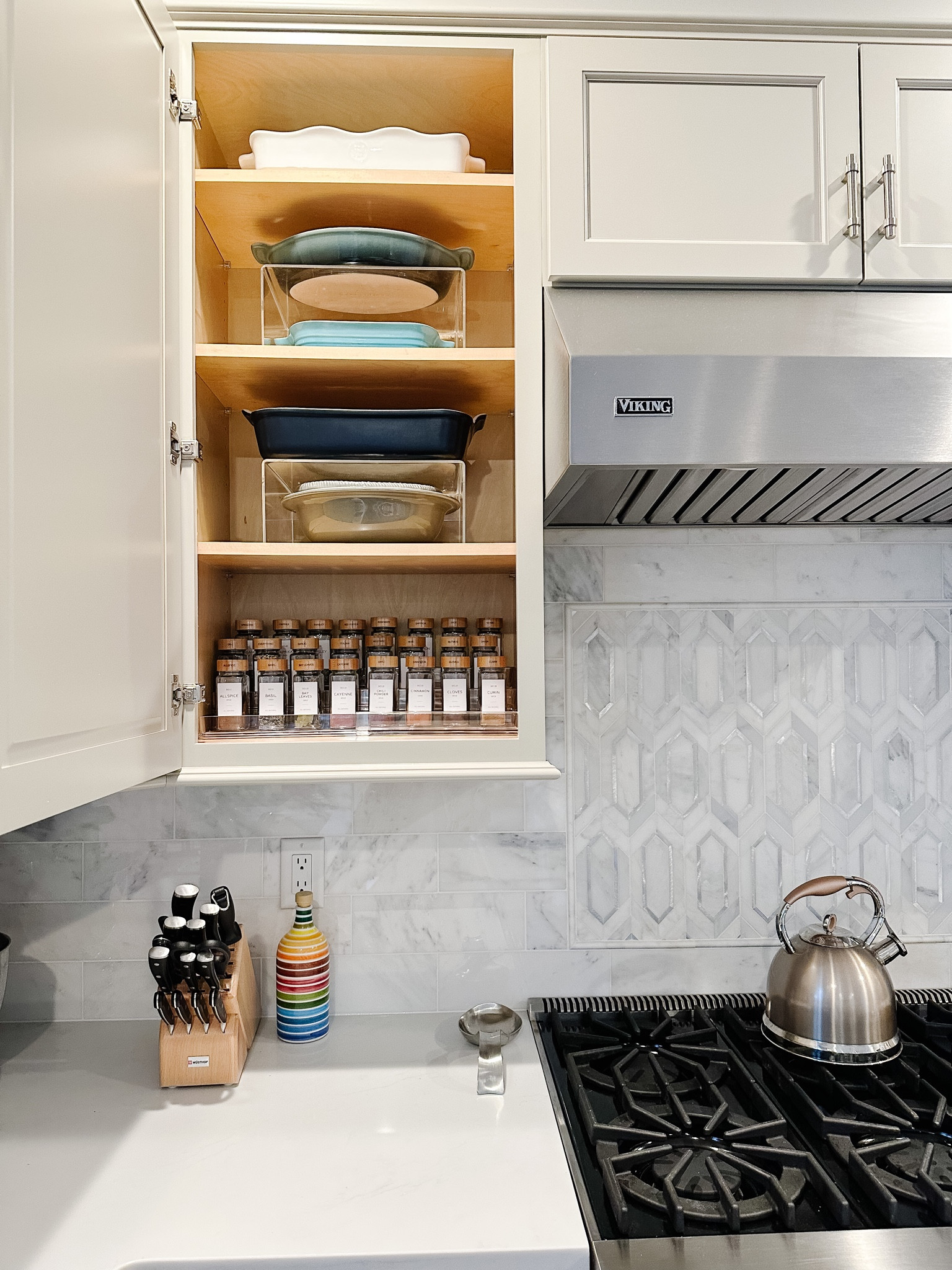 Maximizing space with risers in your kitchen cabinet ✨

#LTKhome