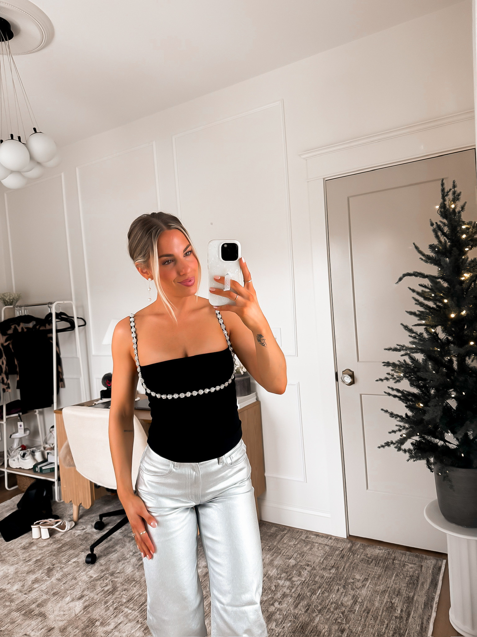 New Years Eve Outfit inspo ✨ 

Black too with metallic pants!!👌🏻 wearing my true sizes (XS) in the top. Size 25 in the pants * I do recommend sizing up tho! 

#LTKFindsUnder100 #LTKHoliday #LTKStyleTip