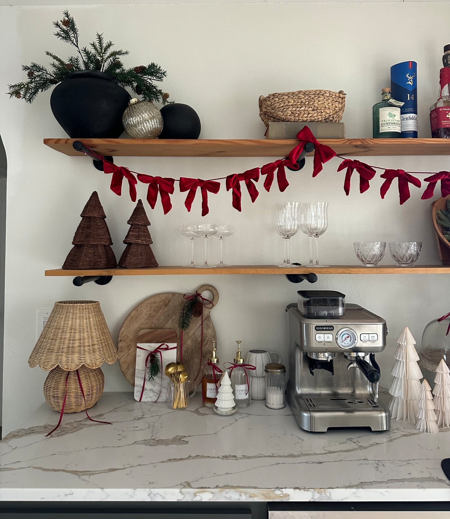 Christmas coffee bar 
Ribbon garland 
Espresso machine
Coupe glasses 
Home bar
Wine glasses 
Vintage glassware 
Home bar 
Pottery barn 
Walmart 
Target 
McGee 
Magnolia 

#LTKHome #LTKFindsUnder50 #LTKHoliday