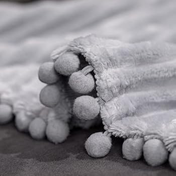 NAISI Flannel Throw Blanket with Pom Pom Fringe and Super Soft Stripe Pattern Lightweight Cozy Fl... | Amazon (US)