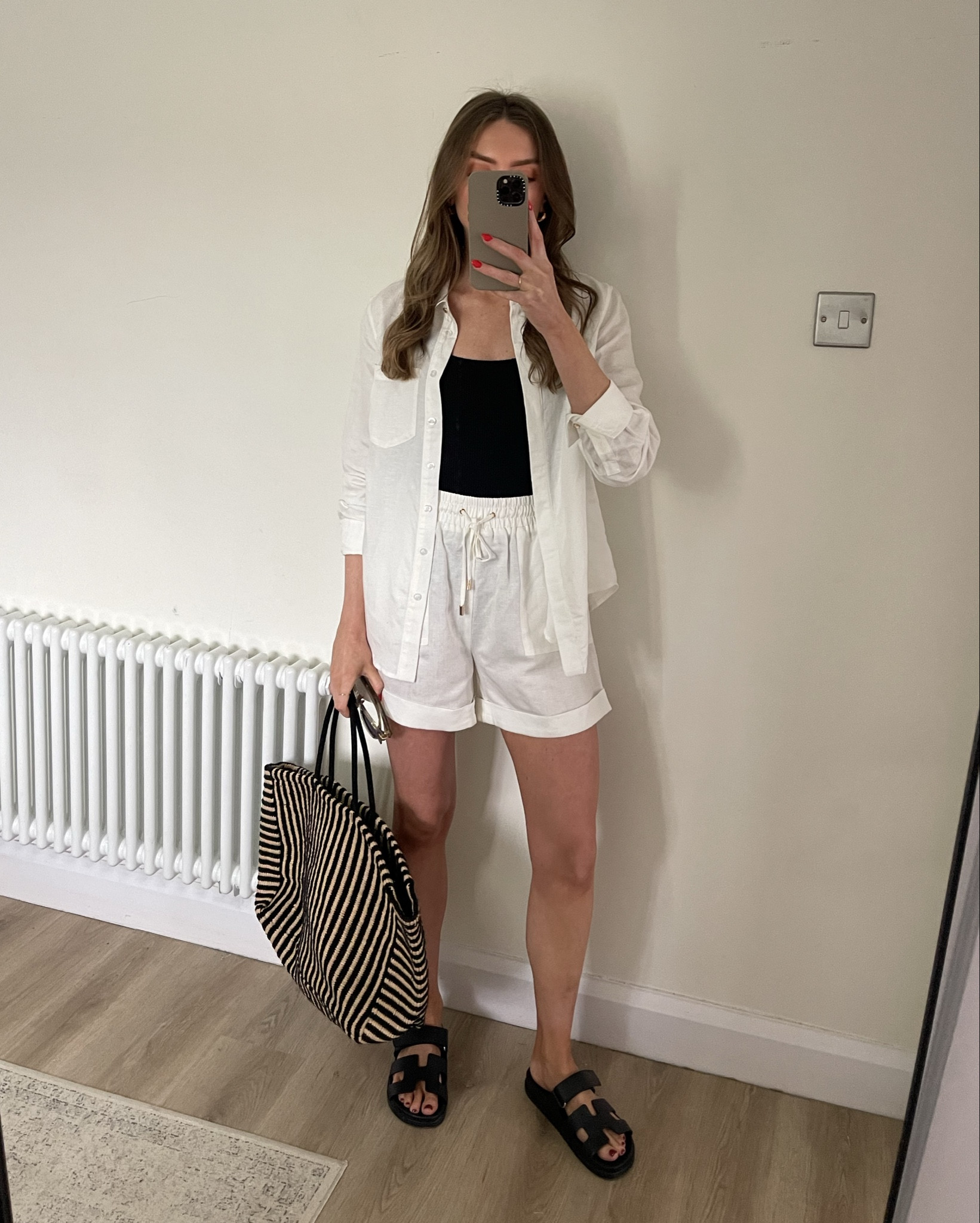 Winter sun holiday outfit ideas 

Accessorize black swimsuit - I wear the small
Size 10 in the Karen Millen white linen shirt
Size 8 in the matching shorts - EMILY15 for an extra 15% off 
Accessorize straw bag 
Hermes chypre black sandals - dupes linked 


Beach look, pool party outfit, daytime holiday outfit 

#LTKeurope #LTKuk