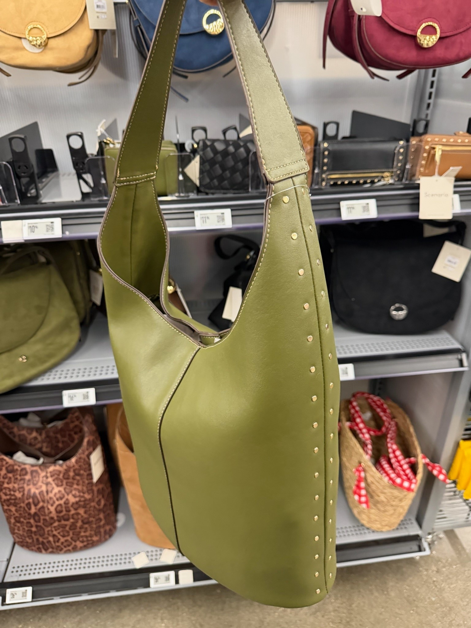 This olive green bag is such a good fall color. The simple shape with the studded detail gives it just enough personality, and it’s the perfect shade to pair with denim, chocolate brown, cream, and all the rich tones of the season.

olive green handbag, fall handbag, green bag, studded handbag, everyday purse, fall accessories, shoulder bag, neutral outfit accessories, women’s handbag, fall fashion, TheMomInStyle

#LTKootd #LTKSeasonal #LTKOver40