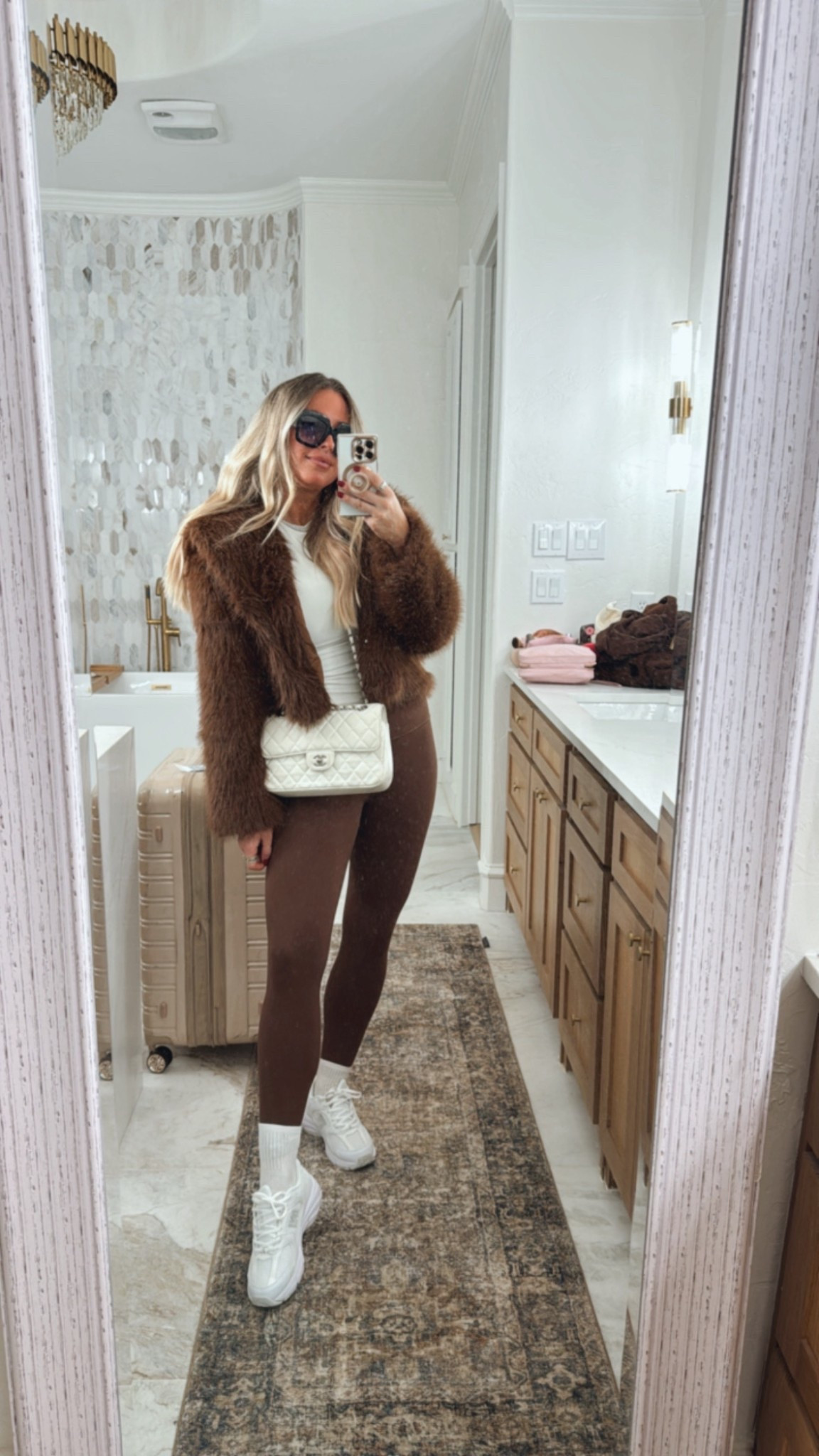 Faux fur coast sized up to large. Travel outfit. Ski outfit.  new arrivals. Workout set. Lululemon looks for less. . Cozy travel outfit.  sale. NYE. New Year’s Eve outfit. Winter fashion. Winter outfit. Puffer vest. Holiday outfits women. Holiday accessories. Fitness. Workout. Athleisure. Vibrating pad. Vibration plate. 





#LTKSaleAlert #LTKmomlife #LTKTravel