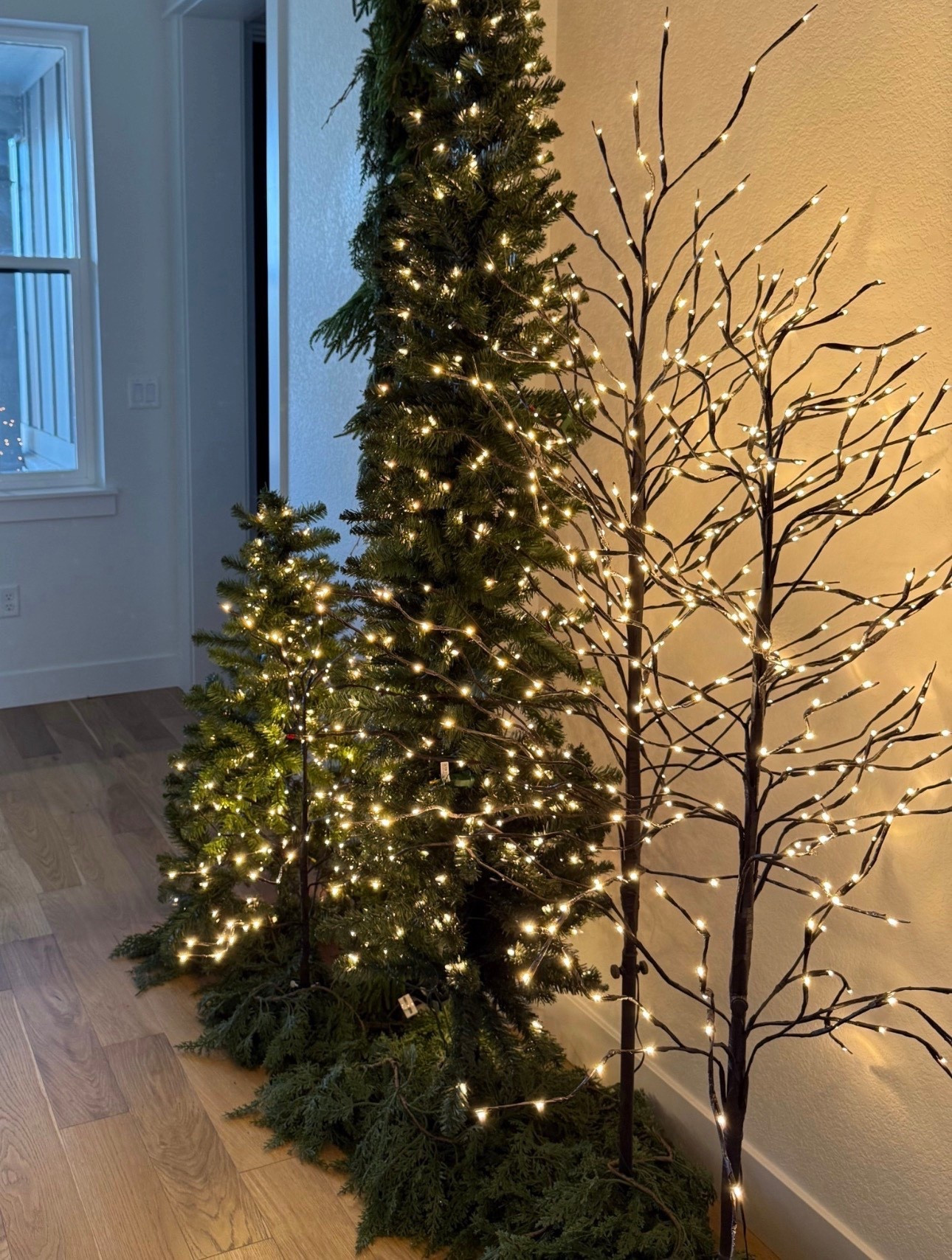 Twig trees and garland. Christmas decor! 

#LTKSeasonal #LTKHome #LTKHoliday