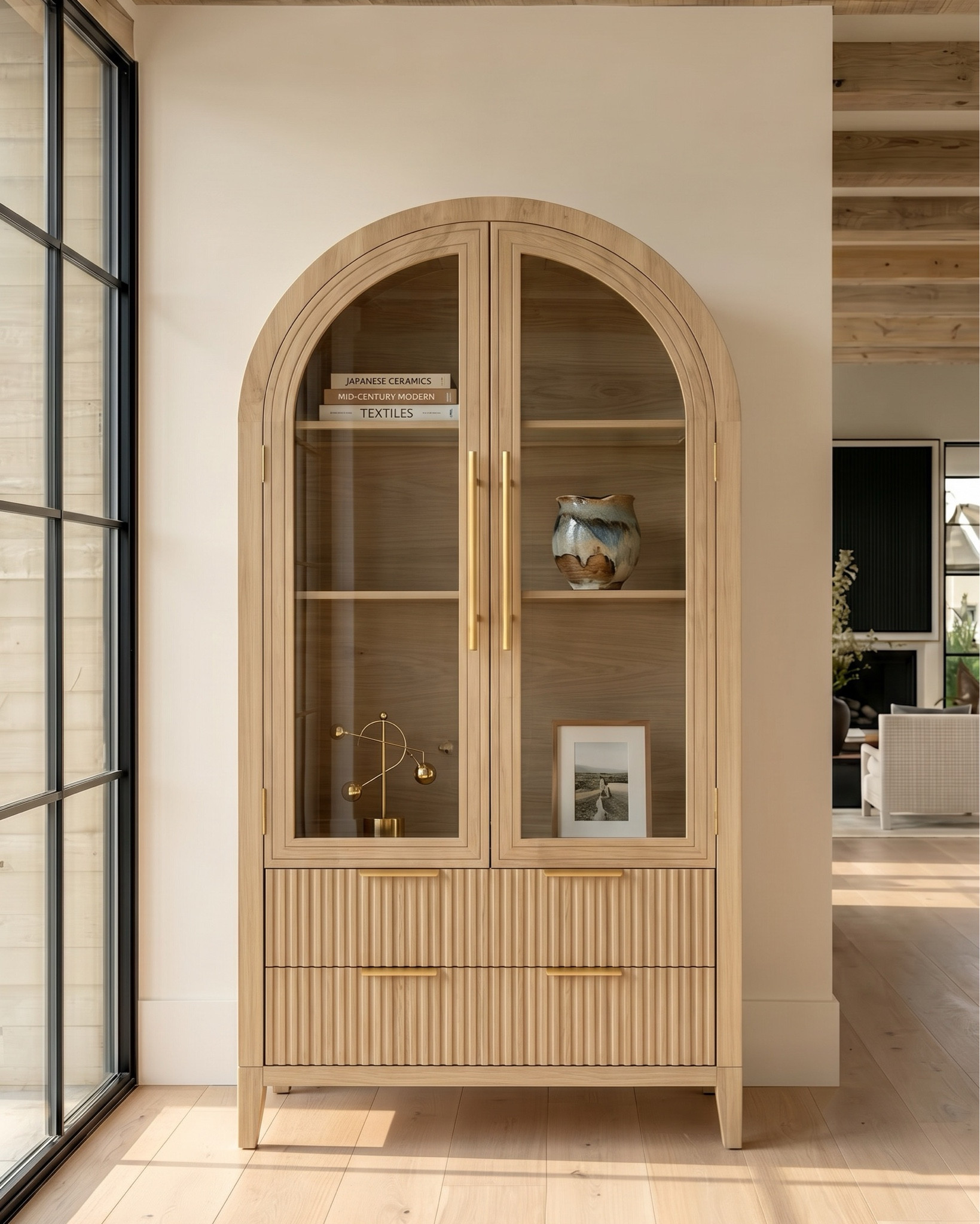 Oak wood extendable dining table
Wood cane dining chair
Beige jute rug
Wood oak console credenza 
White ceramic vase 
Distressed terracotta vase
Ceramic table lamp 
Brass gold decor figures 
Decor book 
Oak wood display cabinet 
Brass gold chandelier 
Glass brass wall sconce 
Blue subtract wall art 

#LTKSaleAlert #LTKHome