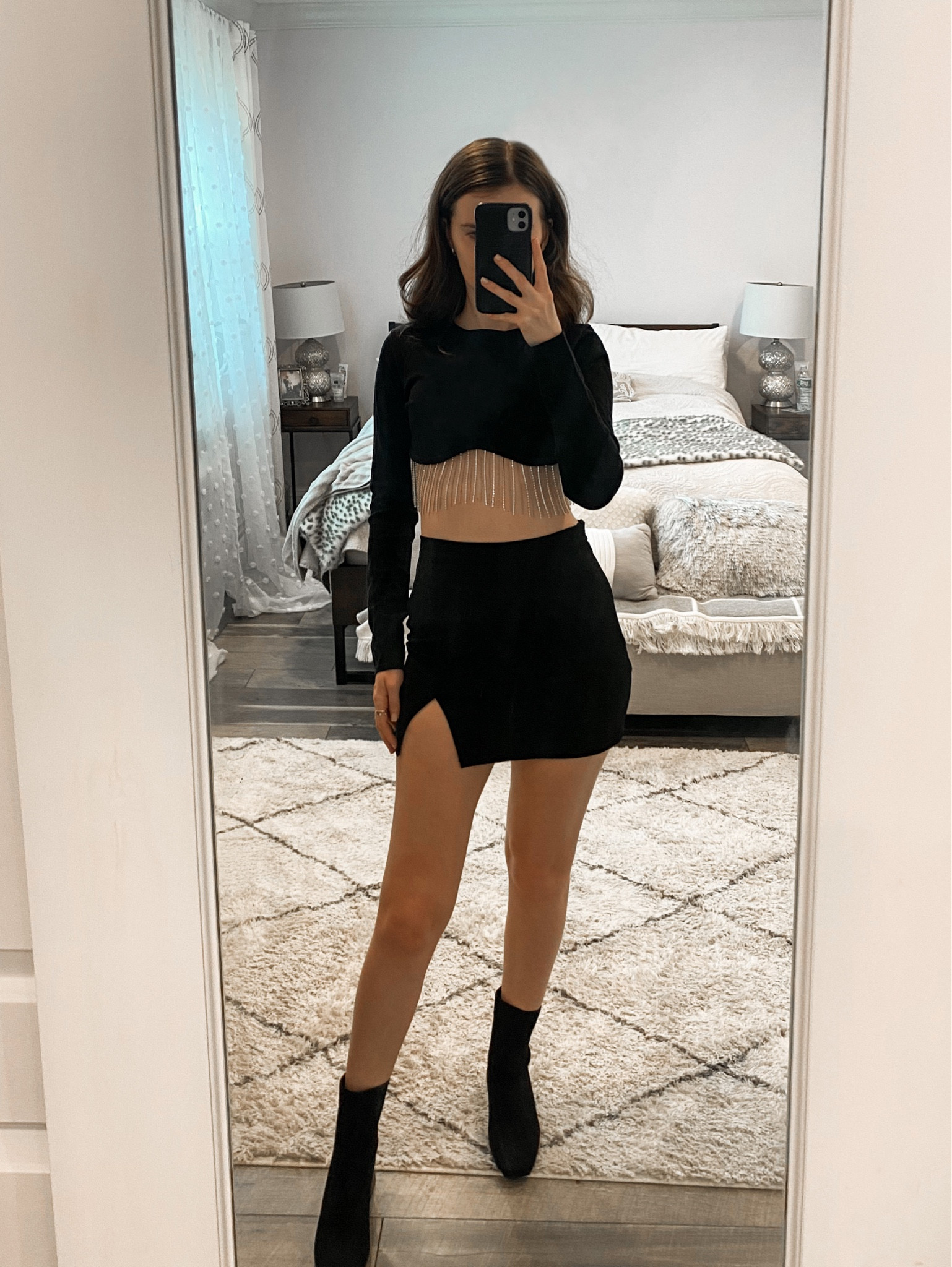 A rhinestone top paired with a black skirt and ankle booties makes a cute New Year’s Eve or going out outfit. 
.
.
.
.
.
.
#LTKSeasonal #LTKHoliday #LTKFind #LTKU #LTKitbag #LTKshoecrush #LTKstyletip #LTKtravel #LTKunder50 #LTKunder100
Going out outfits | going out tops | New Year’s Eve outfit | New Year’s Eve top | skirt outfit | skirt and boots | winter skirt | black mini skirt | black skirt outfit | amazon fashion | amazon finds | boots outfit | boots winter | booties outfit | black booties | ankle booties | sock booties | 