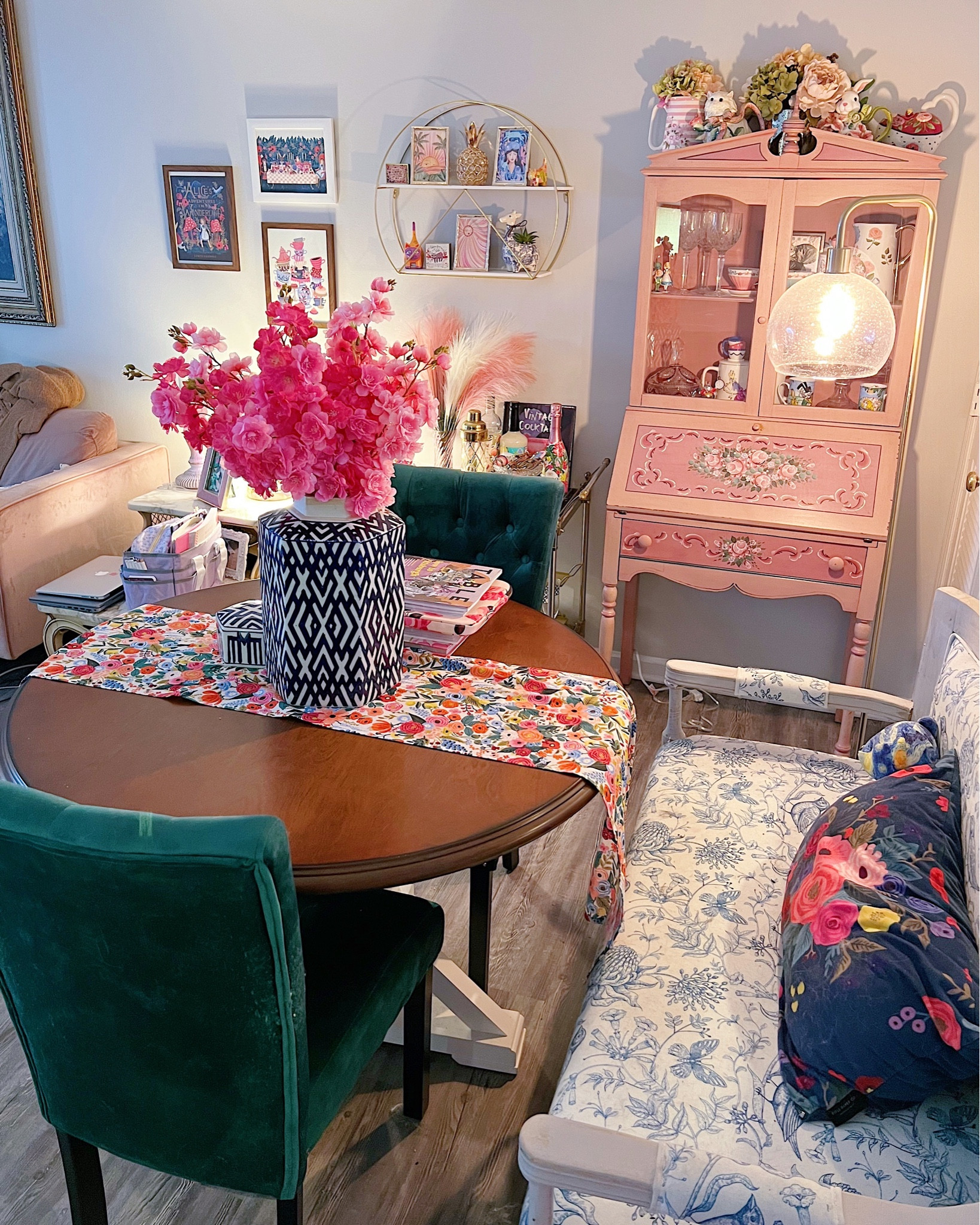 Dining room decor, round dining room table, pedestal dining table, velvet dining chairs, blue and white toile print upholstered bench, gold bar cart, colorful home decor, eclectic home decor 

#LTKsalealert #LTKFind #LTKhome