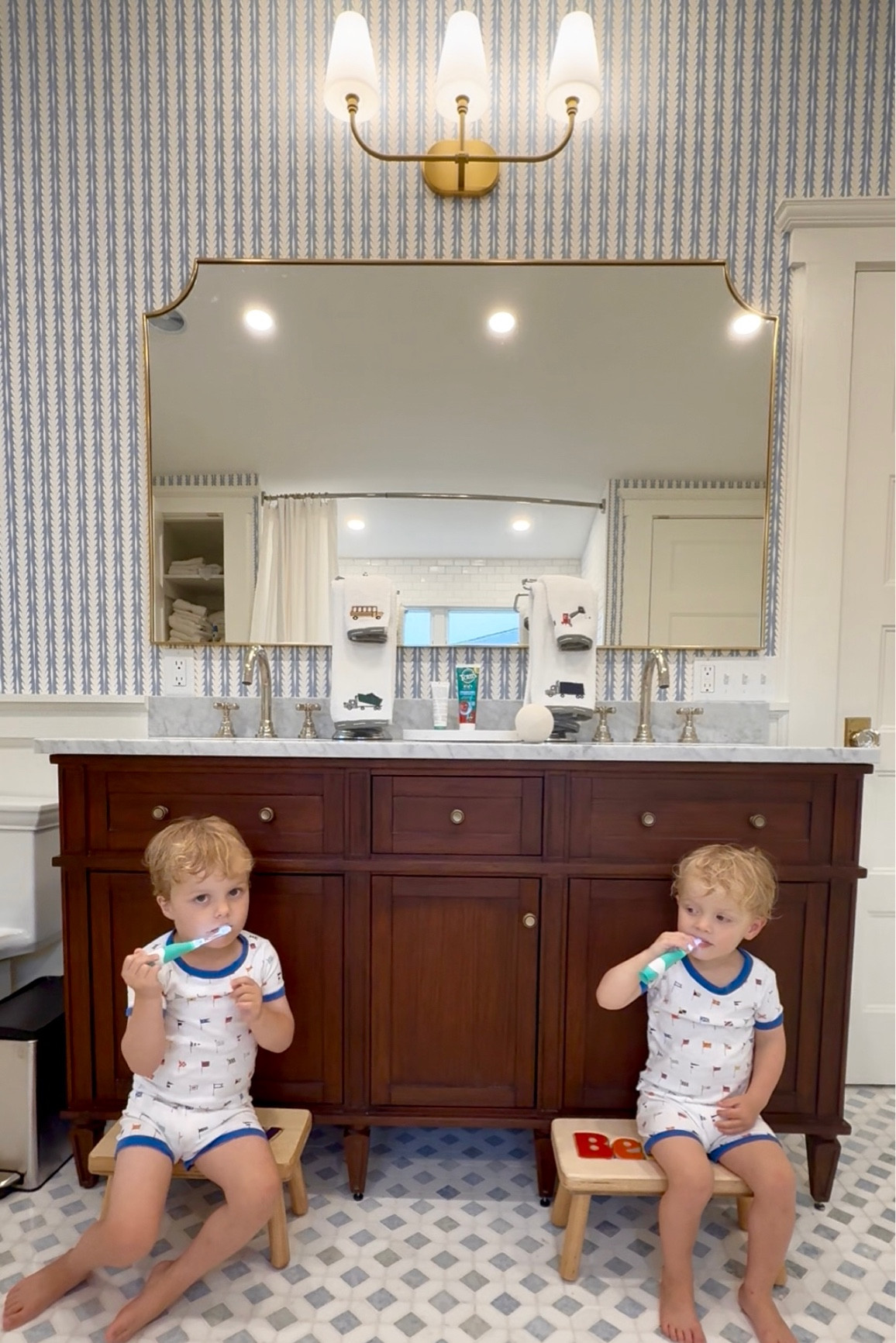 From barely functional to one of my favorite rooms in the house. 🛁💙
When we bought this place 2.5 years ago, the kids’ bathroom didn’t even work. 😂 Fast forward to today, and it’s one of the spaces I love most. We extended the roofline and added a second laundry area—it’s crazy to see how far we’ve come. #kidsbathroom #BathroomRenovation #CoastalHome #TraditionalHome #TimelessInteriors #ClassicHomeStyle #LTKHome #LTKBathroom #LTKKids #LTKRefresh #LTKFinds #CoastalLiving #CoastalDecor #BlueAndWhiteDecor #BeachHouseStyle #NauticalTouches #FamilyHome #MomLife #HomeWithKids #FunctionAndStyle #EverydayElevated 

#LTKkids #LTKfamily #LTKhome