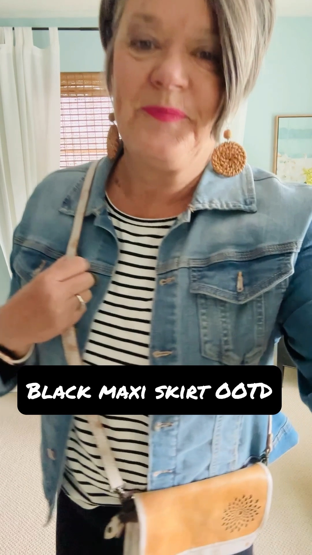 How to style black Maxi skirt for everyday! A basic black maxi skirt works perfectly with a striped top layered with denim jacket and white sneakers. Fun earrings and beautiful leather crossbody bag completes this fun look. #fashionatanyage #blackmaxiskirt #denimjacket 

#LTKStyleTip #LTKMidsize