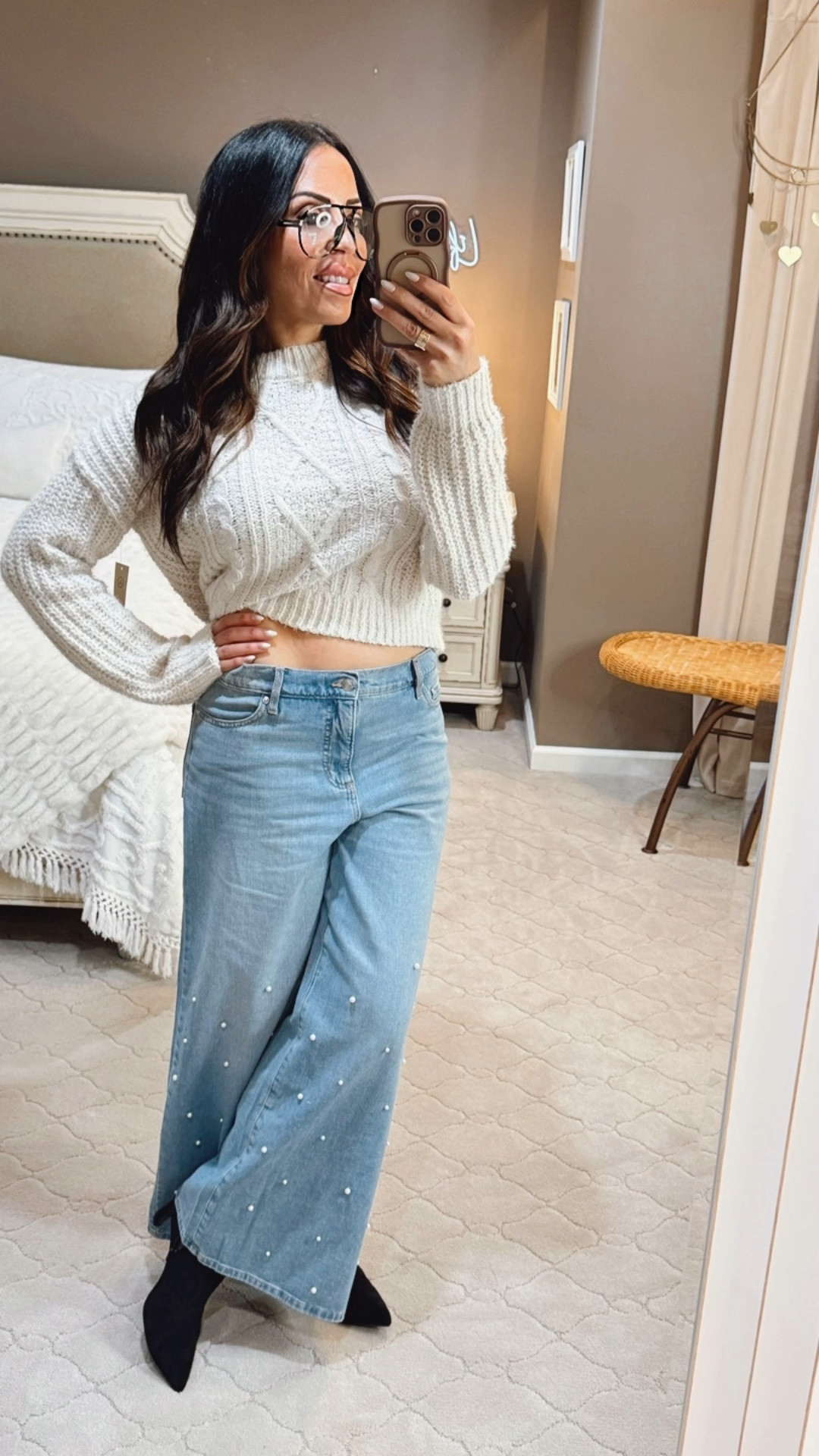 👖 Back to the 2000s... but BETTER! ✨
Who remembers those low-slung jeans from the early 2000s? 🙋‍♀️ Well, guess what? They're back, but with a chic, modern update! I'm in my 50s and I promise you, we can absolutely rock this trend!
Forget the super-low risers of the past—this version is a comfortable, low-rise wide-leg that feels SO fresh! And how fun are these pearl embellishments? Paired with a cozy, cropped cable-knit sweater, it's the perfect mix of nostalgic fun and modern elegance. 😍
Don't wait for these hot pieces to sell out!💖 
#LowSlungJeans #Y2KFashion #Y2KAesthetic #WideLegJeans #DenimTrends #PearlEmbellishment #FashionOver50 #StyleOver50 #MidsizeFashion #CableKnitSweater #CroppedSweater #WinterOutfit #MustHave #ShopNow #OOTD #DenimStyle #FallFashion

#LTKFindsUnder50 #LTKOver40 #LTKootd