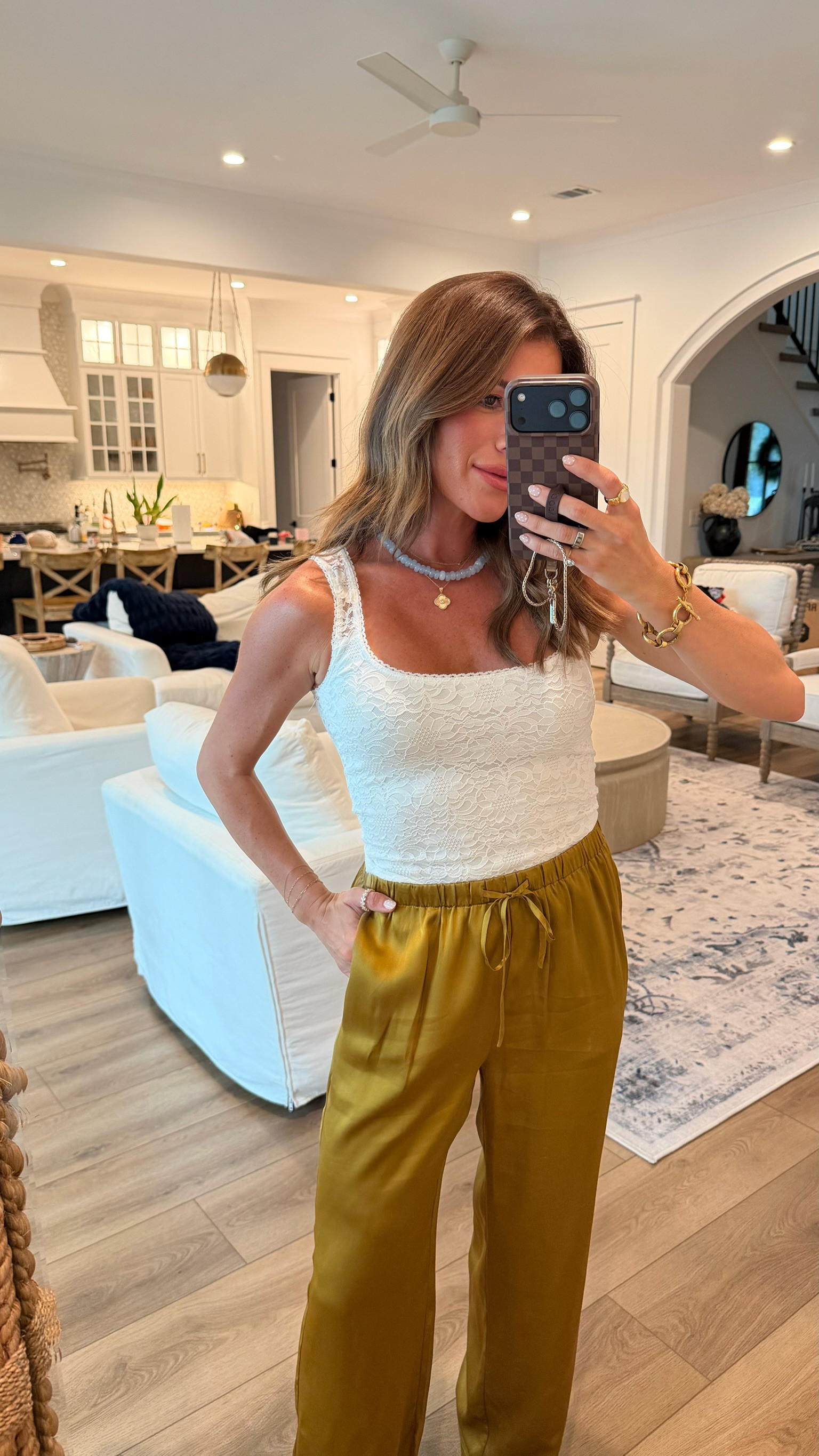 A chic late-summer look with a lace tank and silky wide leg pants, easy, elevated, and perfect for transitioning into fall.

lace tank top, satin pants, wide leg pants, olive pants, summer outfit, early fall outfit, transitional style, chic casual, elevated basics, dinner outfit, date night look, neutral outfit, effortless style, classy casual, summer night outfit, fall transition look, feminine outfit, everyday chic, vacation dinner outfit, polished casual style 

 #LTKootd #LTKOver40 #LTKPetite