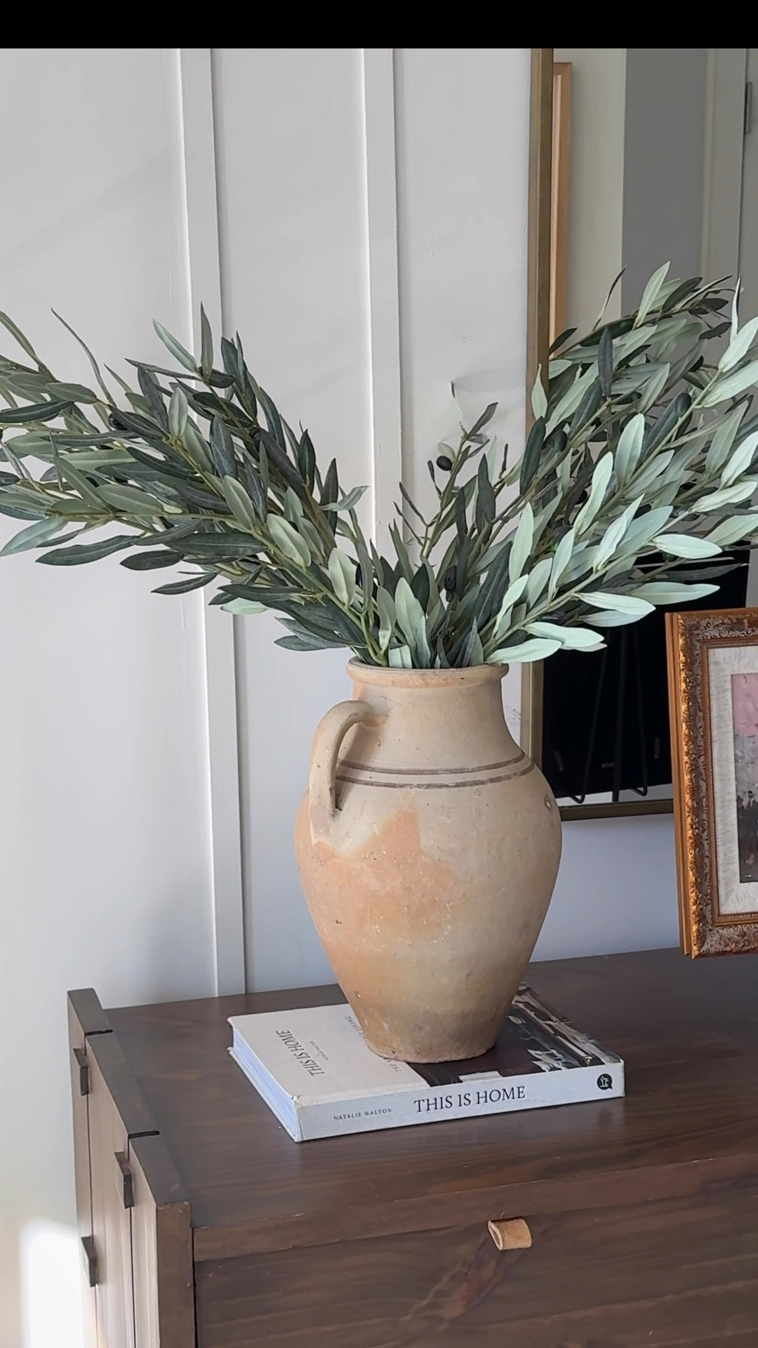 olive stems + terracotta vase I’ve been loving lately. such an easy way to add warmth to a space. #entryway 


#LTKHome #LTKmomlife #LTKU