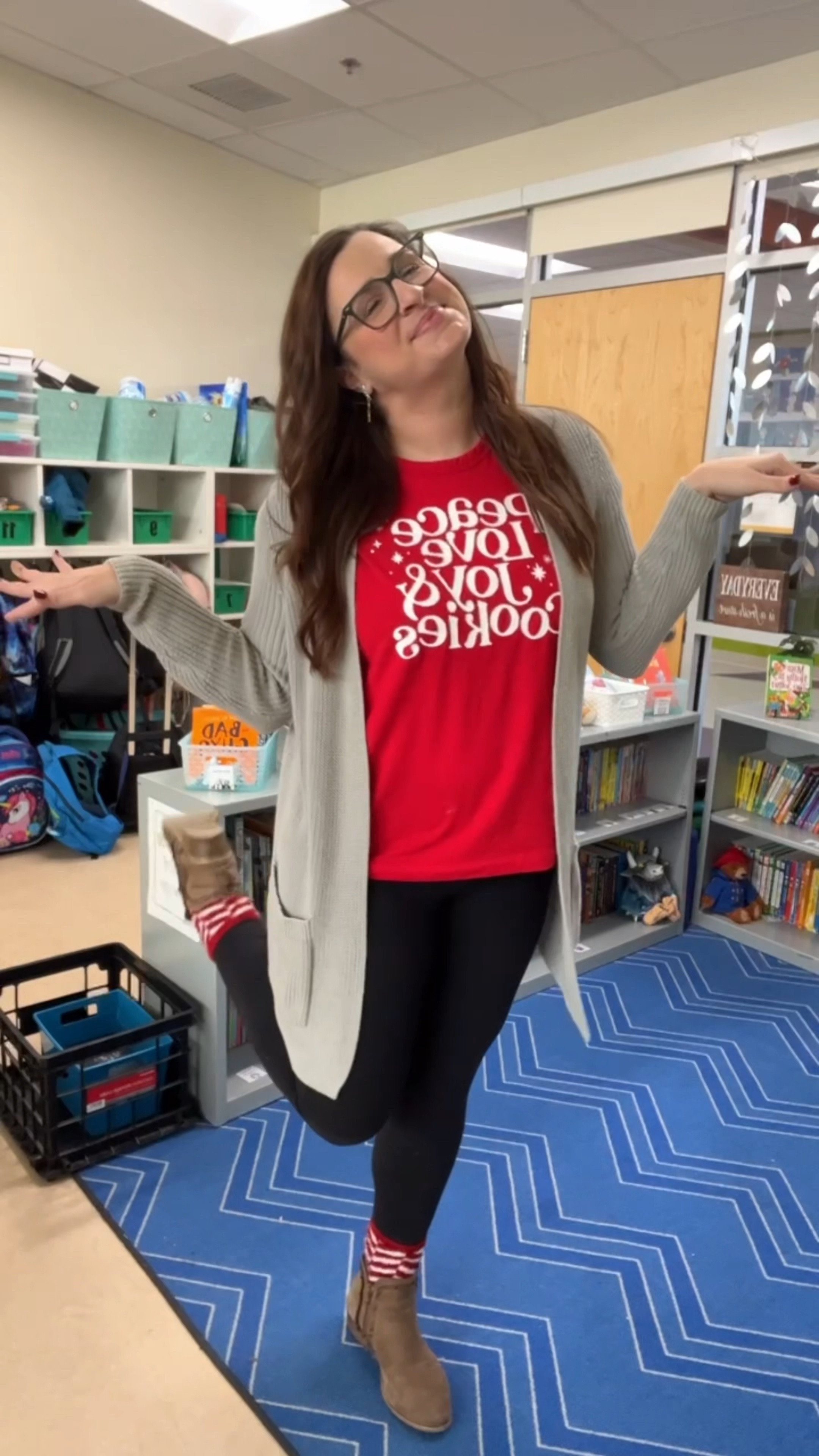 Candy cane day at school today ❤️🤍 Christmas cookie shirt, fuzzy socks, and cute Christmas earrings 🥰

#LTKHoliday #LTKVideo #LTKSeasonal