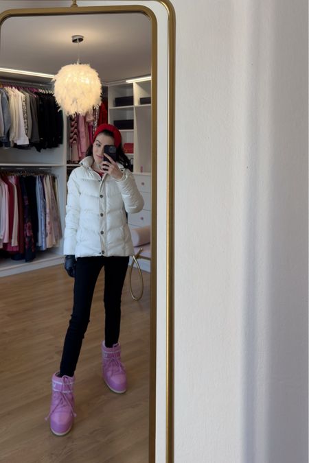 Looking for stylish winter outfits for a snow day? Check out this 2024 fashion trend: a white puffer jacket paired with black ski pants and pink short Moon boots. I added a red earband to keep my ears warm and cozy. This outfit is perfect for a ski day or a winter date in the snow. #skioutfit #snowoutfit #skipants #pufferjacket #moonboots

#LTKSeasonal #LTKtravel #LTKMostLoved