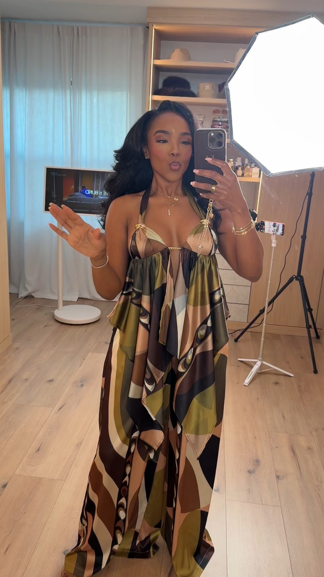 Resort-ready and effortlessly bold 🌿 This printed halter maxi is the definition of statement without trying too hard. The flowy silhouette and rich earth tones move beautifully, making it one of those pieces that instantly feels luxe. Styled solo here, but add gold heels or a structured clutch and the cost per wear keeps dropping for every vacation or summer event.

The halter neckline frames the shoulders perfectly while the draped fabric keeps it comfortable and flattering. It’s giving elevated resort wear with minimal effort.

Perfect for: vacation dinners, tropical getaways, resort nights, summer parties, beachside cocktails, or destination events.

Tap to get details and favorite to revisit before your next trip.

📏 Sizing:
Wearing size Small  
Height 5’4” · 140 lbs · 36D · 27” waist · 40” hips

This post includes resort wear women, vacation maxi dress, halter dress styling, tropical outfit inspiration, summer evening outfits, statement print dresses, beach vacation looks, and capsule wardrobe pieces styled multiple ways.

Follow me on Instagram and YouTube @kirasfashionfinds