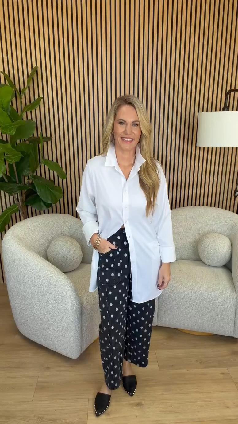 A classic white button down with a little personality! I love these black and white polka dot wide leg jeans paired with this oversized white button down shirt. The contrast is so cute, and the black pointed toe studded mules give the outfit a dressier finish. Such a fun way to wear denim for the office, meetings, or lunch while keeping the look comfortable!

Sizing: 5’3” | Small button down | Size 6 denim | Size 7.5 shoes

White oversized button down, black polka dot jeans, white polka dot denim, wide leg printed jeans, women’s fall workwear, business casual outfits, black pointed toe mules, studded flats, petite office fashion, fall denim outfits, Audrie Dollins