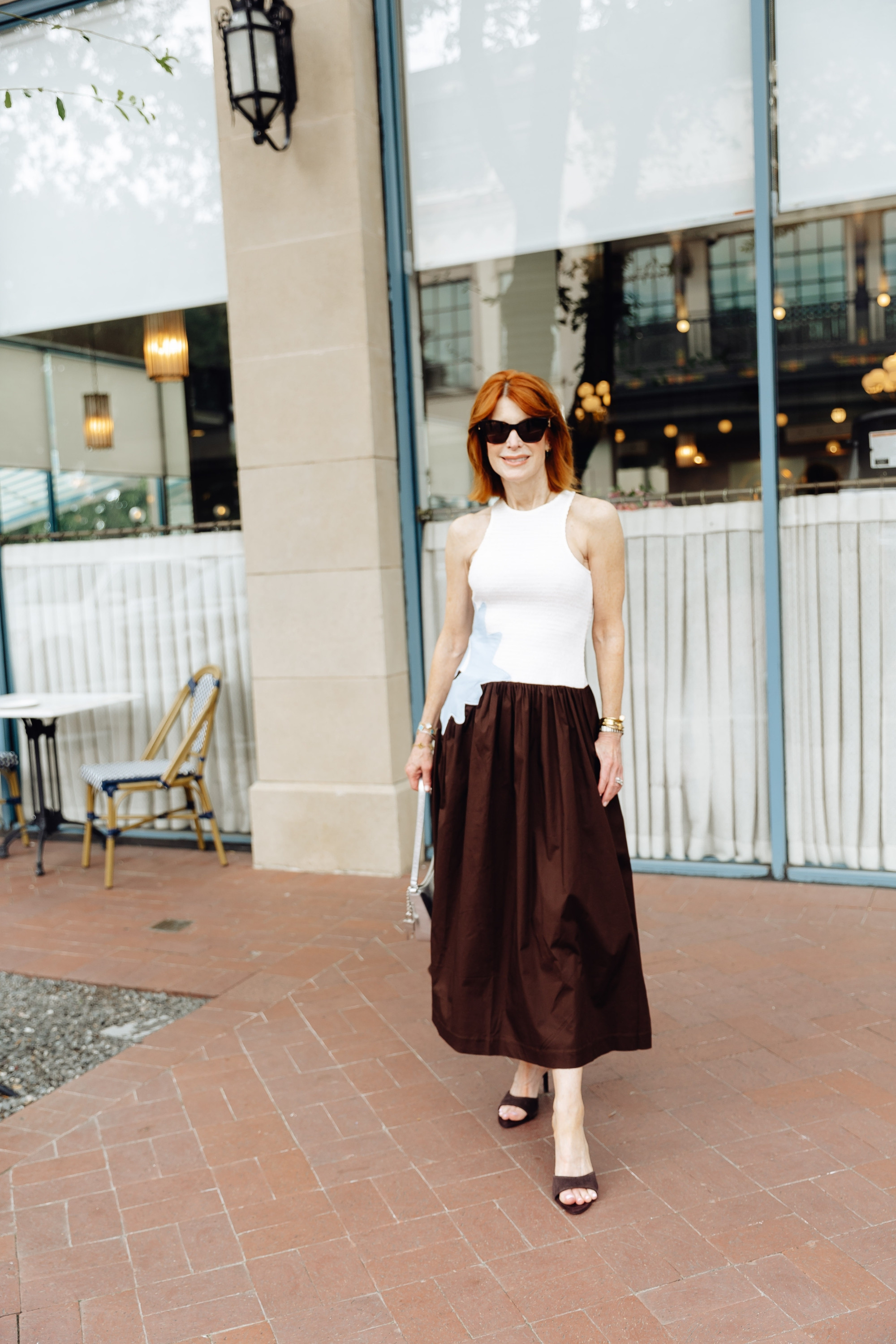 This statement summer dress is such a fun way to make getting dressed easy. I love the bold brown skirt, white textured top, and unexpected blue appliqué detail — perfect for summer outfits, dinner plans, or vacation style. #LTKootd

#LTKOver40 #SummerDresses #SummerOutfits #VacationStyle 

 #LTKootd #LTKSeasonal #LTKOver40