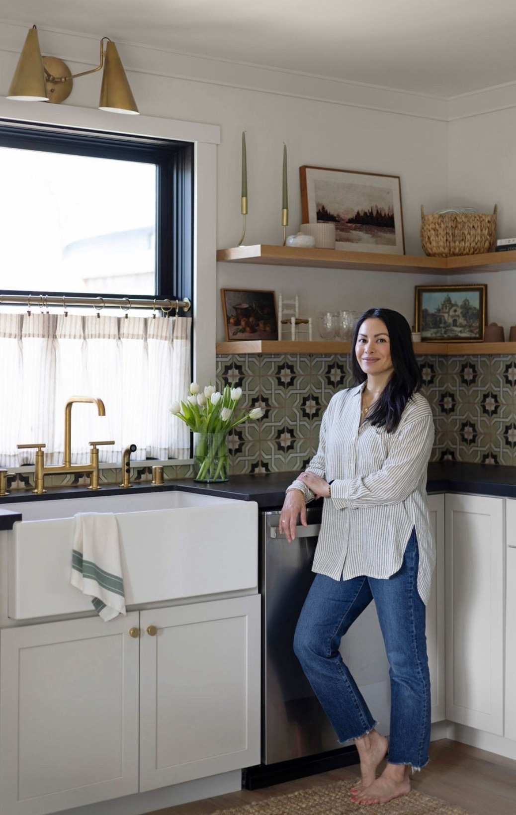 Check out my recent kitchenette ADU project! My fave features are the green patterned backsplash tile, brass lighting and brass plumbing fixtures. Kept the photoshoot outfit simple to focus on the beautiful space!

#LTKOver40 #LTKWorkwear #LTKHome
