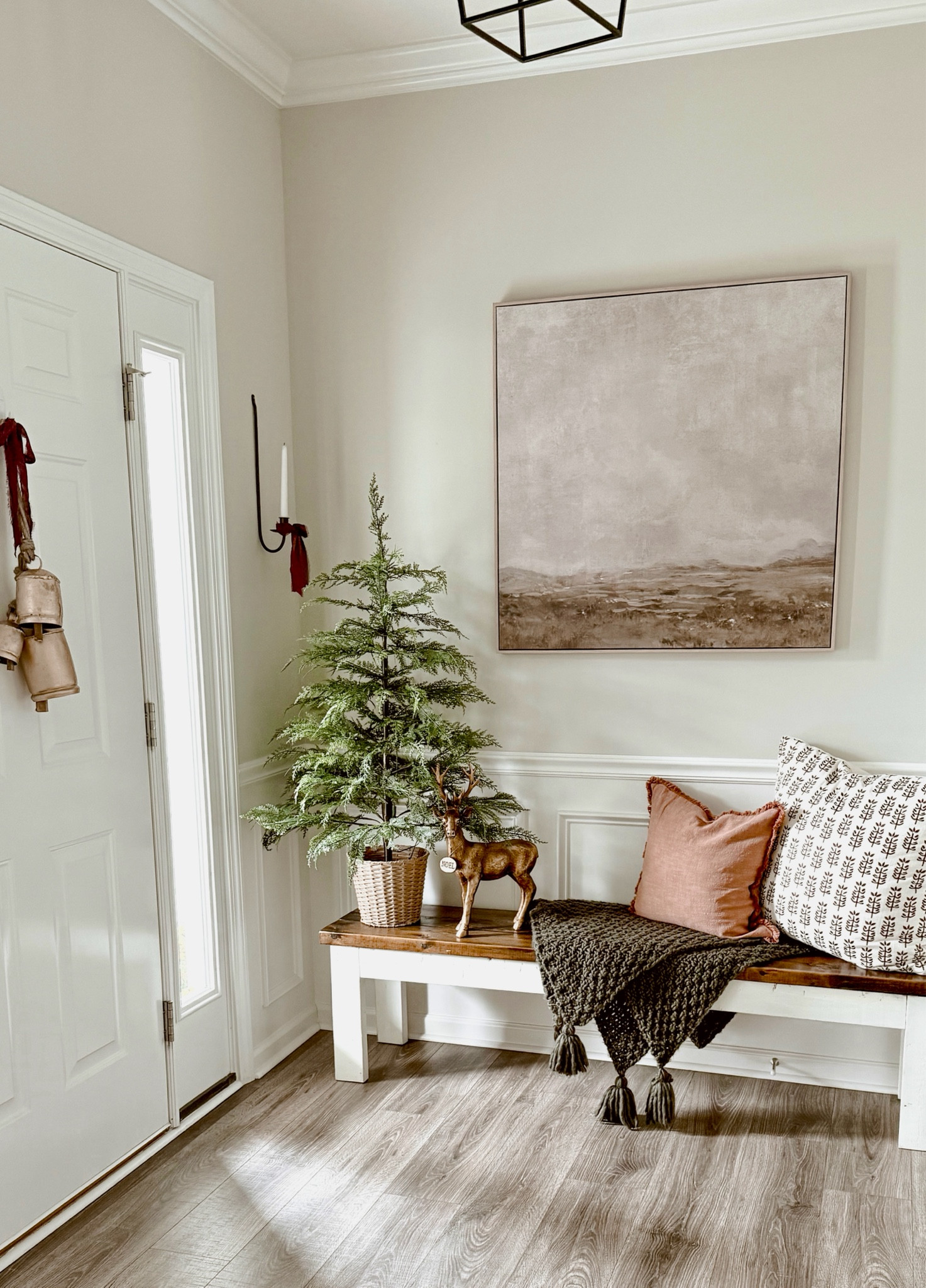 Touches of Christmas in our entryway. 



#bells #vintage #christmasdecor #ribbon #MyTexasHouse #evergreen #wallart #wallsconces #candles #throwpillows #burgundy 

#LTKHome #LTKHoliday #LTKSeasonal