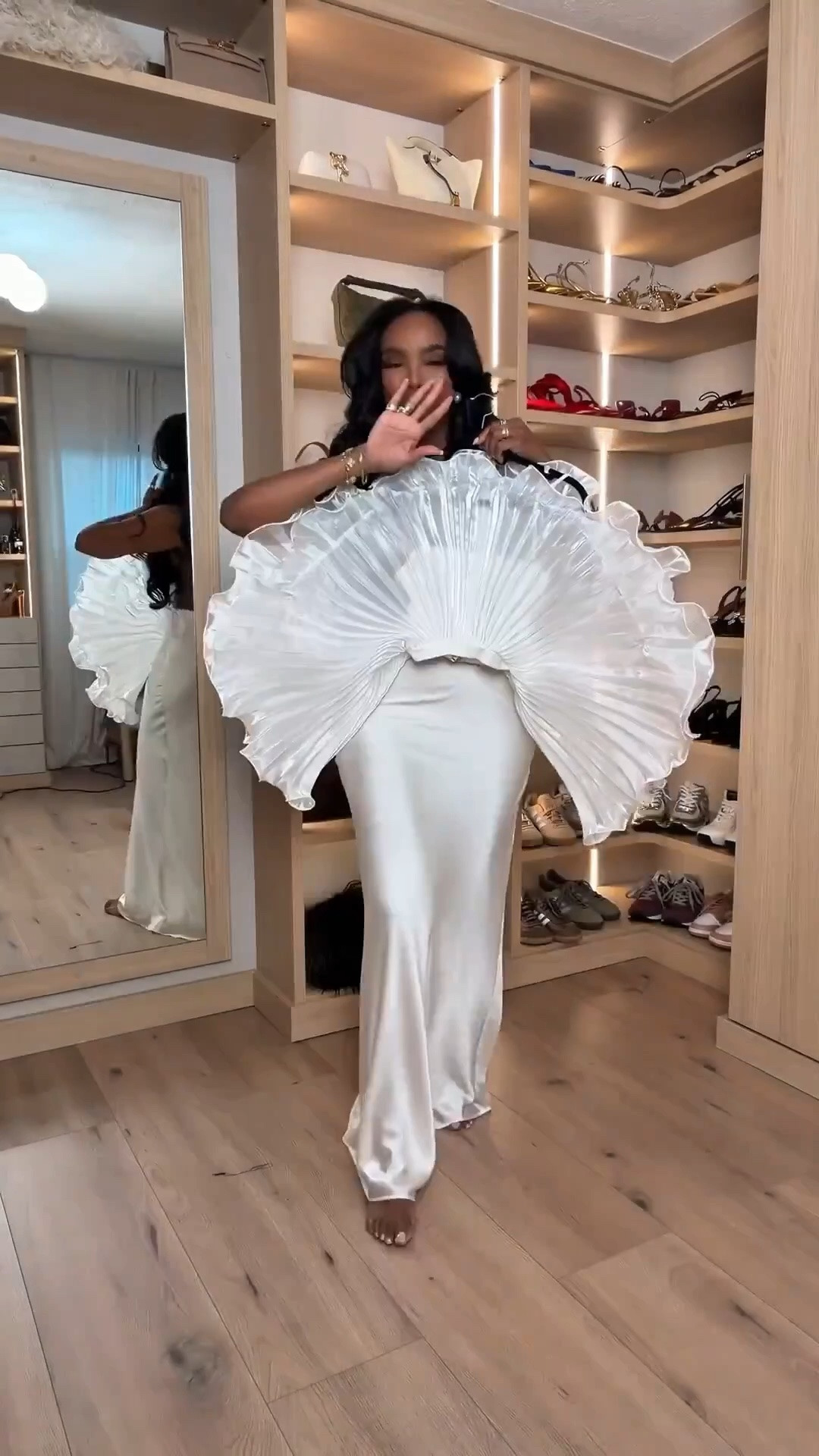 Hi Babes! 

Okay this look is pure ART 🤍 The dramatic pleated sleeves mixed with the silky fitted maxi skirt creates such a high fashion editorial moment while still feeling feminine and elegant. This is one of those statement outfits that instantly turns heads the second you walk into a room.

I love pieces like this because you honestly don’t need much styling — the outfit does all the talking. Soft glam, loose waves, and minimal accessories keeps the whole look feeling luxe and elevated.

Perfect for:
• Wedding guest looks  
• Luxury vacation dinners  
• Birthday outfits  
• Fashion events  
• Engagement party looks  
• Upscale evening events  

Everything is linked below ✨

xx Kira | IG: KirasFashionFinds

34D - 27 - 40 • Size Small or 4