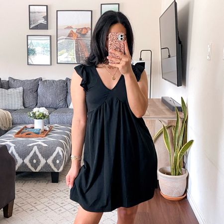 i'm wearing this dress in a size medium and it fits true to size. the fabric is opaque, has some stretch, and a little itchy (not sure if washing it would help). the silhouette is  baggy. 

#LTKStyleTip #LTKFindsUnder50