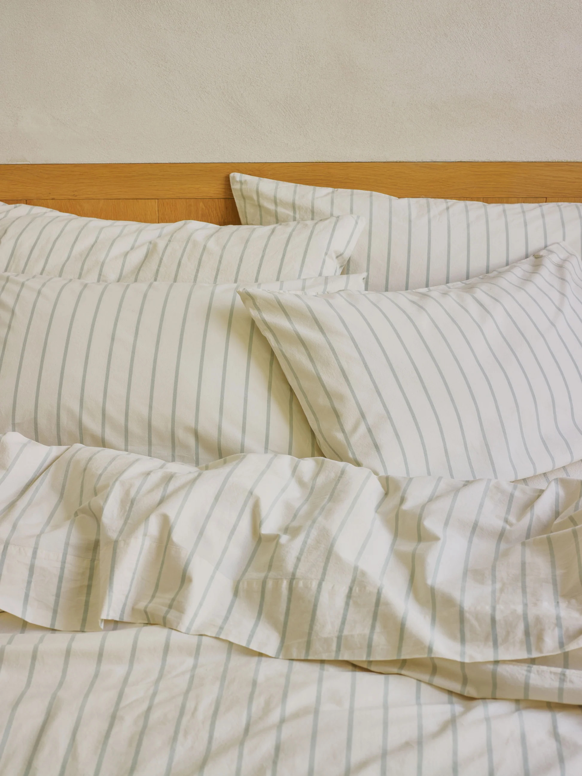 Mellow Green Slumber Stripe Cotton Pillowcases (Pair) | Piglet