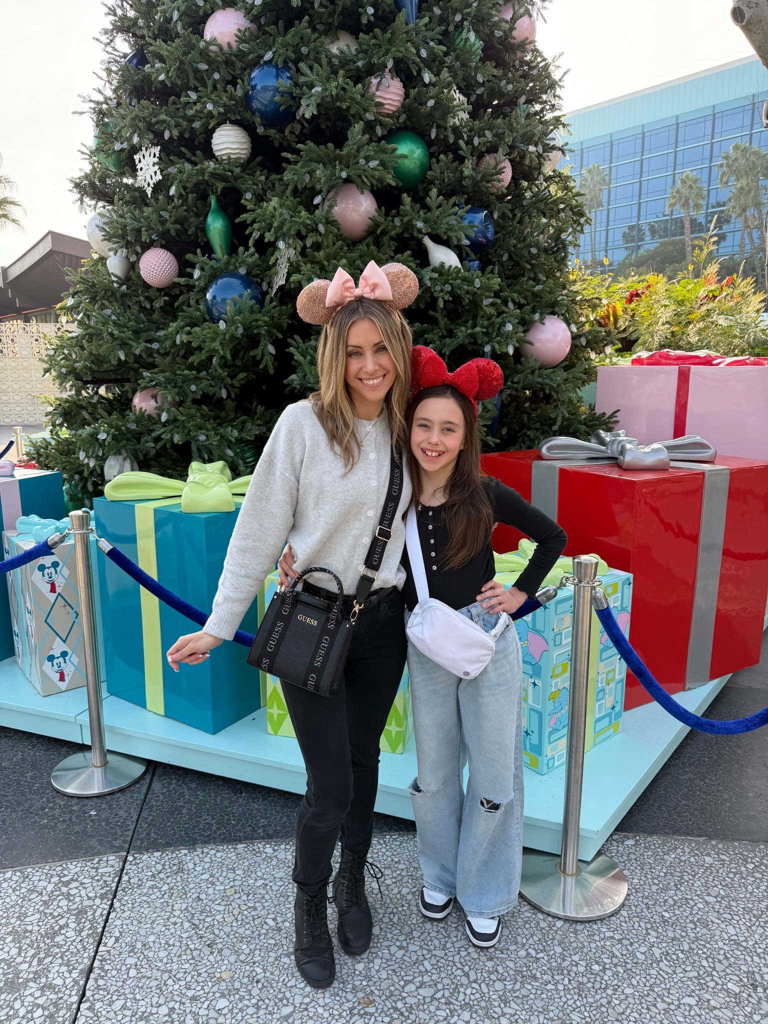 Disney day 🐭 

Sweater, tshirt, high waisted jeans, belt, boots, Minnie Mouse ears, girls long sleeve shirt, girls wide jeans, everywhere bag, tennis shoes.

#LTKdayinmylife #LTKmomlife #LTKPetite