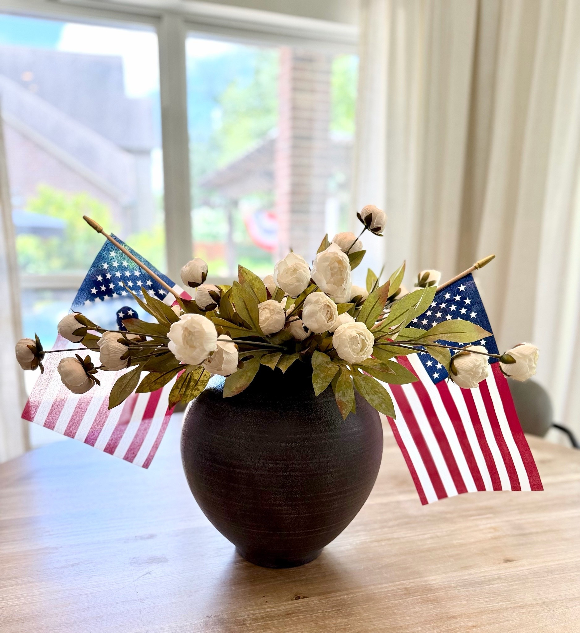 A touch of Americana for the holiday weekend! ❤️🤍💙

These $1 Target flags are the easiest way to give your arrangement a patriotic flare.

Americana
4th of July
Peonies
Vase

#LTKHome #LTKSeasonal