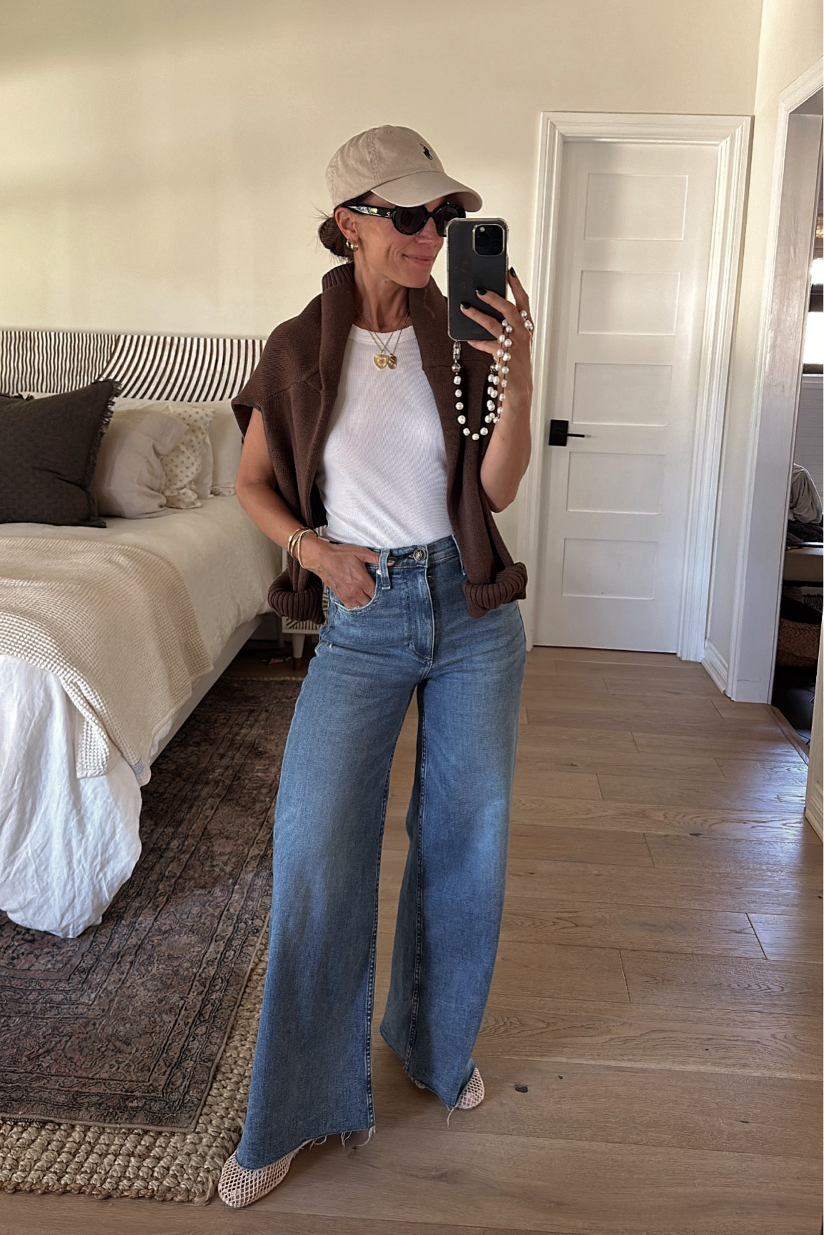 Today’s transitional outfit 
Wore the sweater when it was cooler in the morning, tossed it over the shoulders later in the afternoon 
Jeans are featherweight and so soft- they’re a cropped fit, but fit me perfectly (5’1ish for reference) and I went up a size 

#LTKOver40