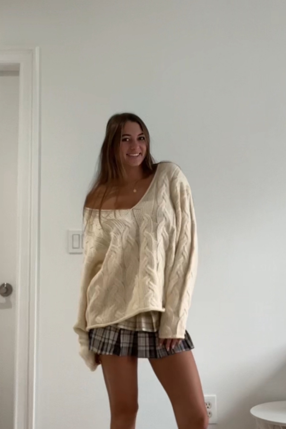 wearing a size small in the sweater and skirt!