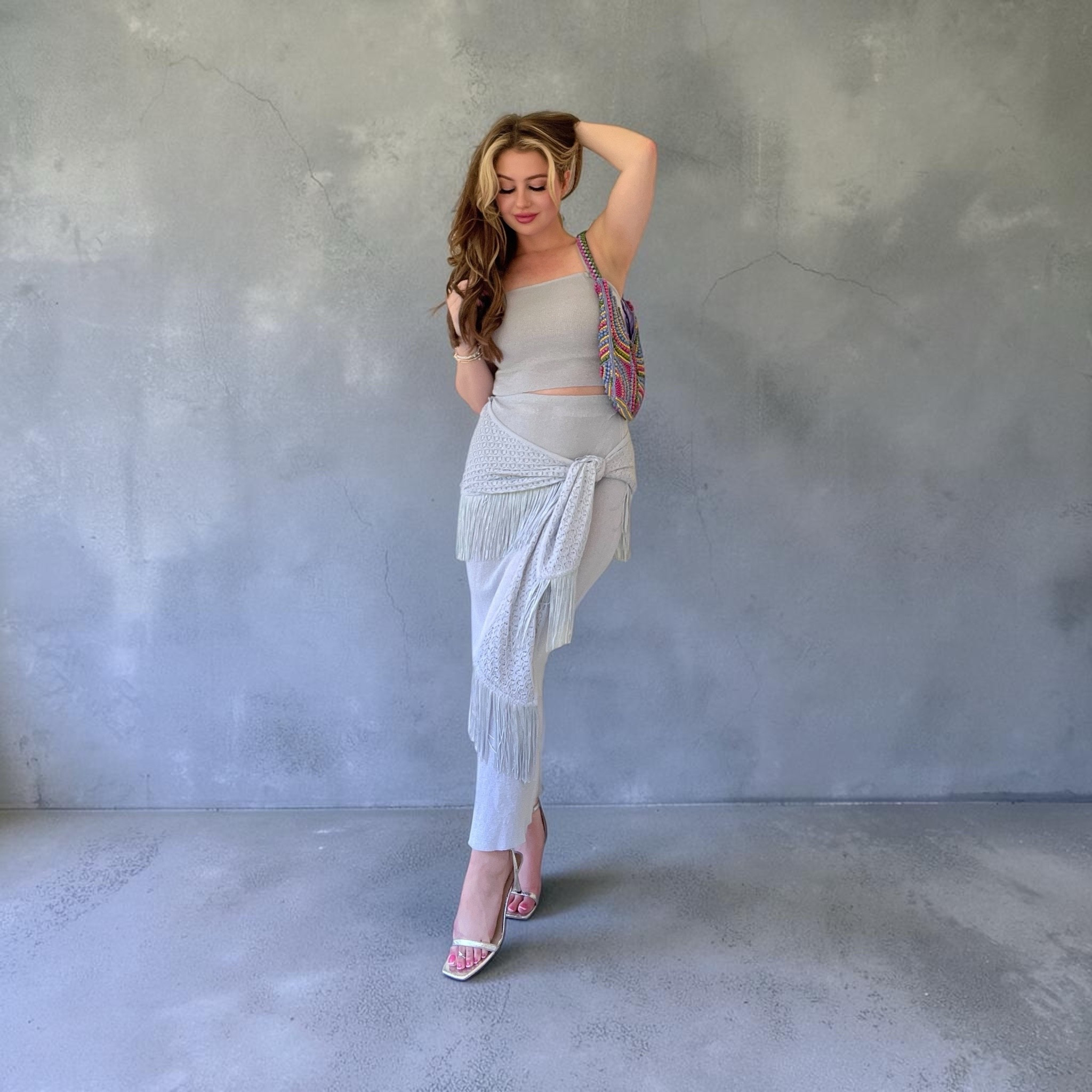 A sheer light fabric with a fun fringe wrap ! The color is a soft grey /blue . I am wearing a size small. Lots of stretch 😇 perfect for a Summer day and could easily look amazing with flats . I paired with a beaded bag for added texture. 💕 exact items linked below @Meshki US

#LTKxMadewell #LTKgrwm #LTKootd