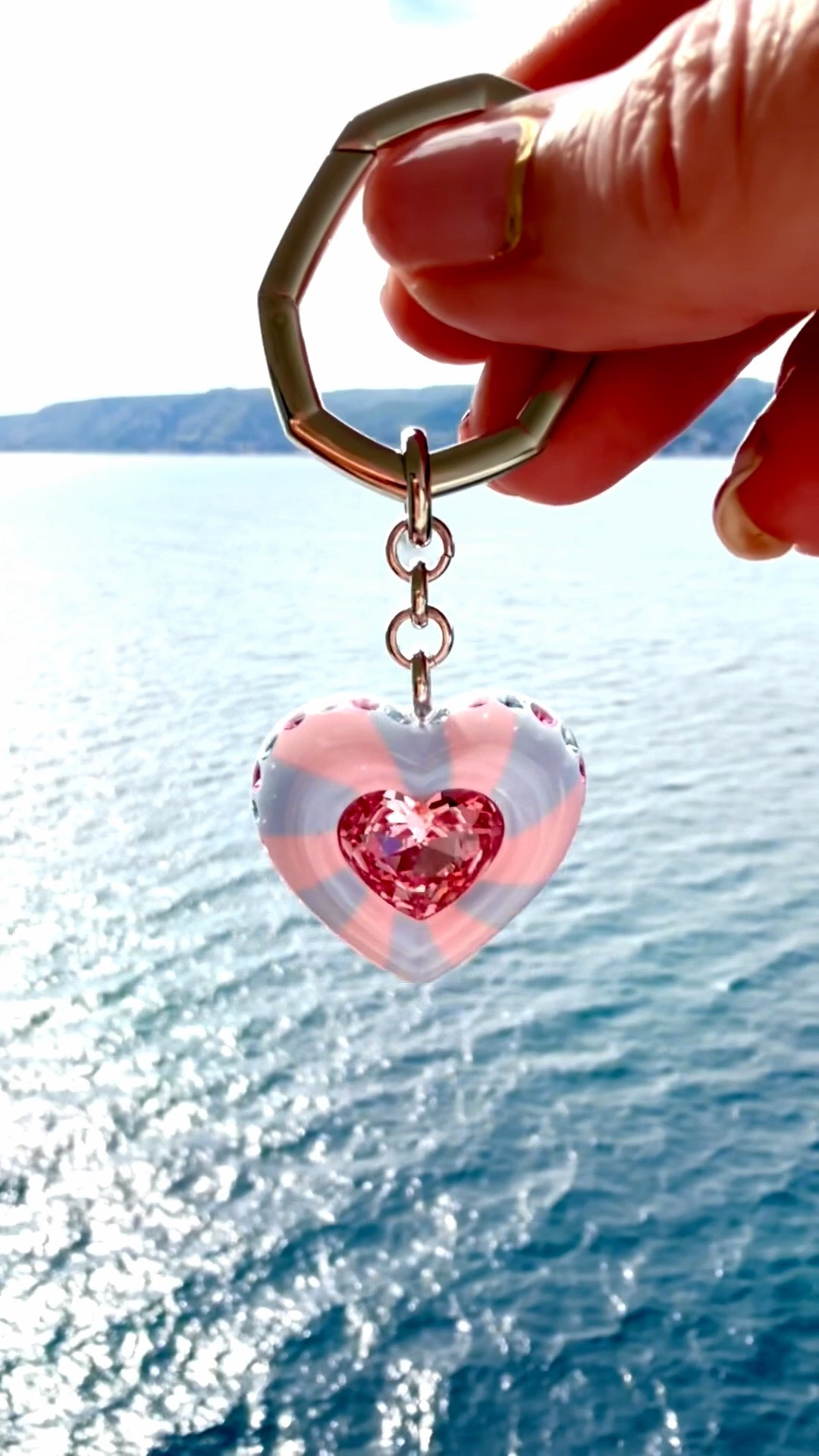 This candy colored key chain caught my eye in Florence for looking like a pool float and it’s going to take me through the summer!

See this and a few other beautiful bag charms you might like below!

Gorgeous heart cut, Heart, Multicolored, Rhodium plated by Swarvoski

Inspired by the Dulcis family, this candy-colored key ring was made for joy-infused style. Attached to a rhodium plated link, the heart-shaped motif is embellished with playful stripes, a large central crystal, and more blue and pink crystals around the edges

#LTKSeasonal #LTKTravel #LTKWorkwear