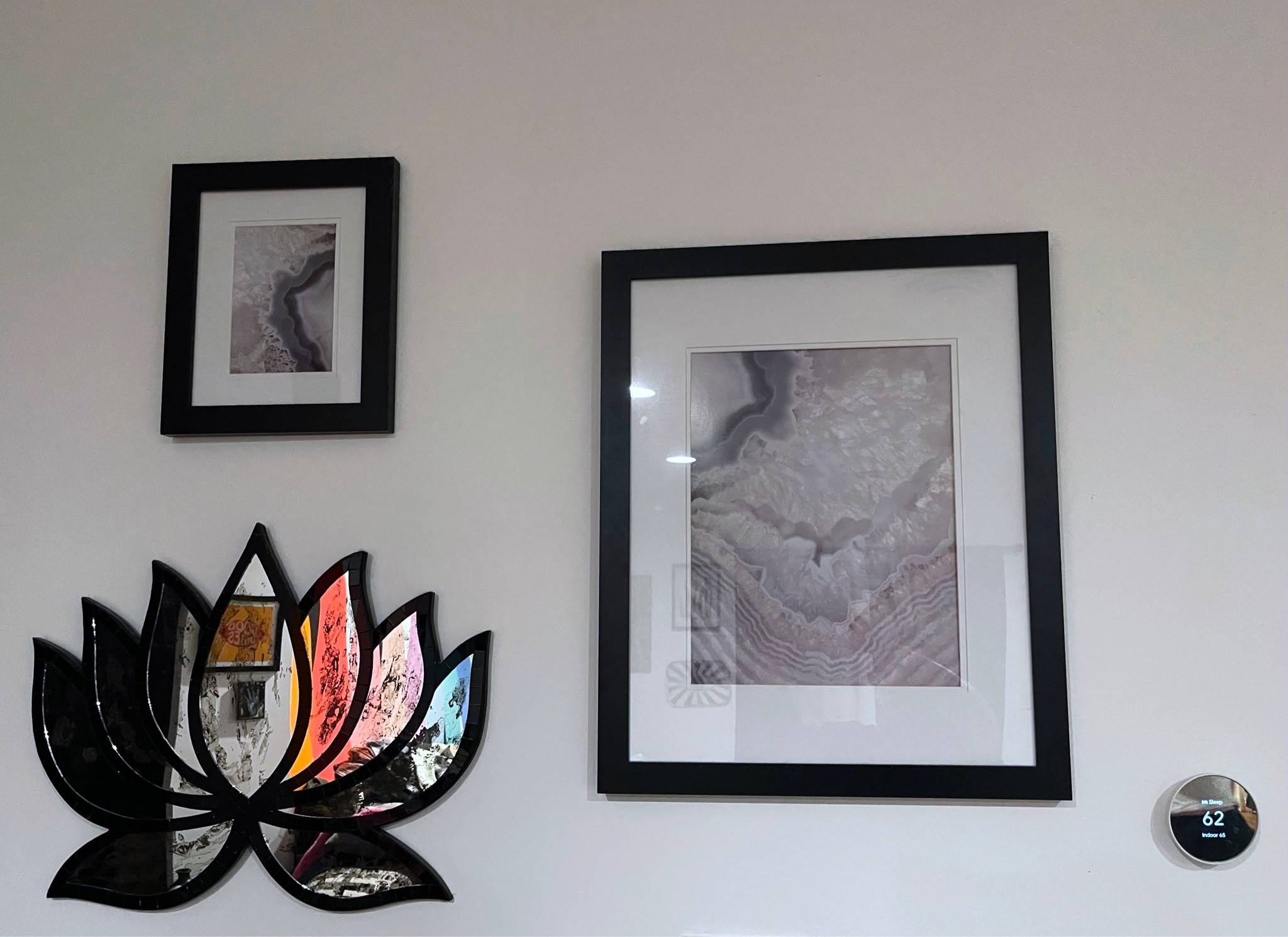 Shop this wall in my home 🖤

I swapped the stock images from these gold frames into these black ones and used the gold frames with other images in another room in our house. 🖼️ 🏡 

Mirror is old from Earthbound Trading but I linked some similar affordable options from Amazon! 🪷 

Our nest thermostat is so, so worth it and handy to control from our phones! 📱

#LTKfamily #LTKhome #LTKstyletip