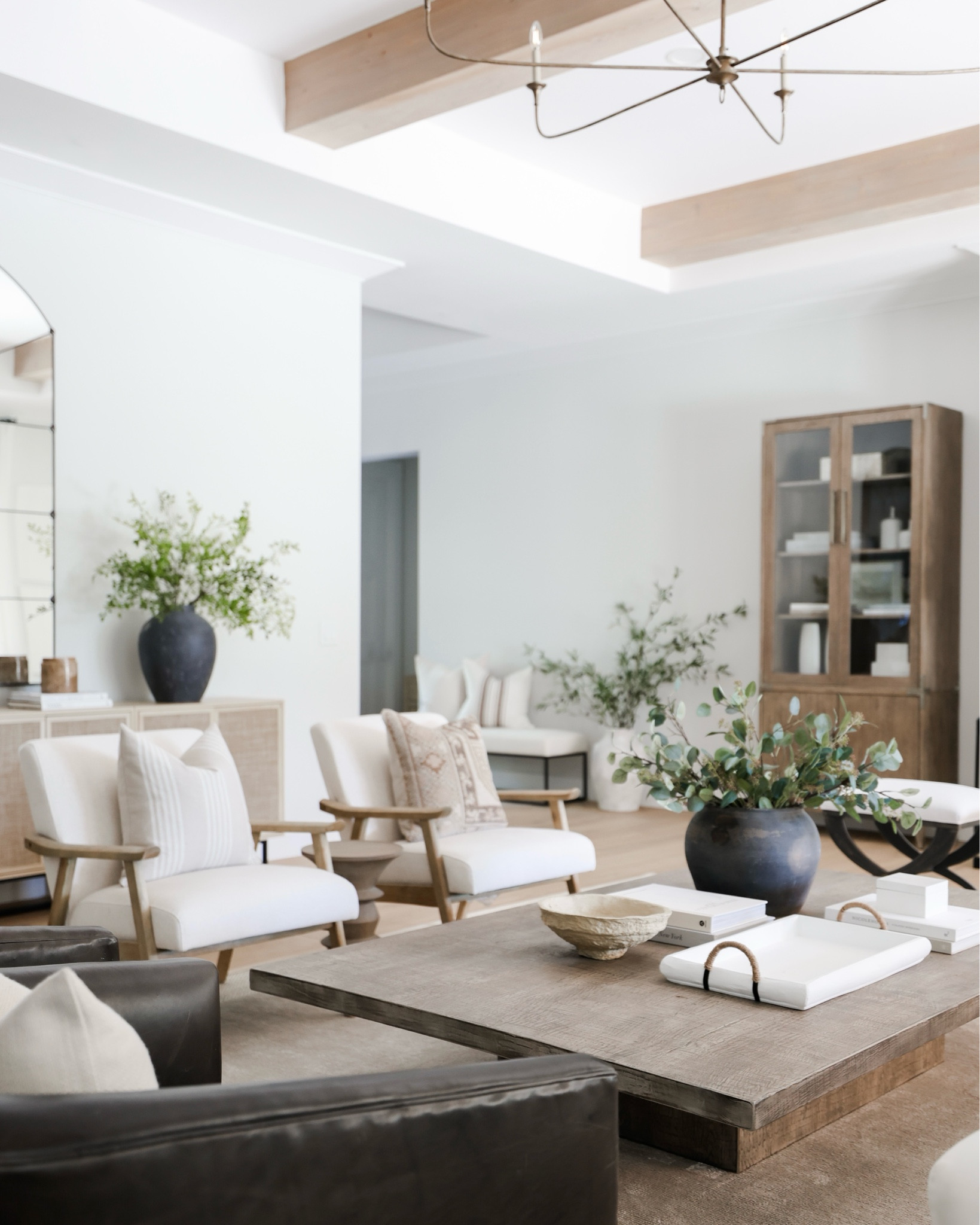 So excited that my accent chairs are back in stock! Love the earthy, organic, vibe that they add! 

Chairs, pillow, coffee table, stems, greenery, vase, bowl, accent table, chandelier 

#LTKhome #LTKstyletip
