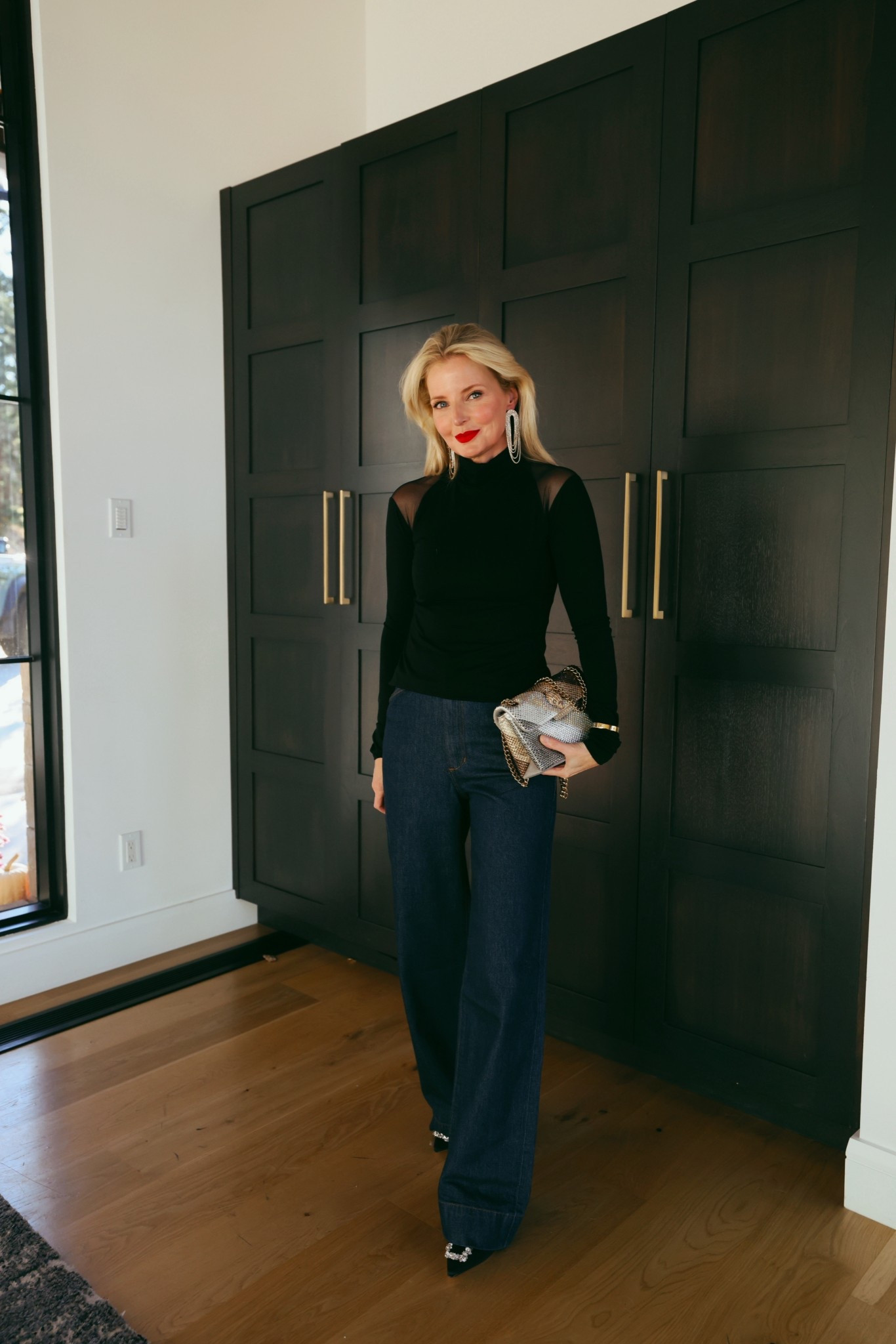For a fail-safe, chic, and effortless holiday look, here's what you need...
1 | Dark wash jeans - These can be dark blue or black.
2 | Solid black top - You could also do burgundy or green. 
3 | Black pumps or black booties - The darker color will lengthen the leg line. Bonus if they have a festive detail. 💫
4 | Festive accessories - The sparklier, the better!
5 | Red lip - Nothing says holiday-ready quite like a sophisticated red lip.

You may have several similar pieces already in your closet, but I can’t recommend these beautiful basics from @Nordstrom enough! I’ve had most of these pieces for 2+ years and love them so much. #NordstromPartner

Oh, and for my petite ladies that don’t want to wear a heel—there is a shortie version of these jeans that I linked below as well! 

~Erin xo 

#LTKHoliday