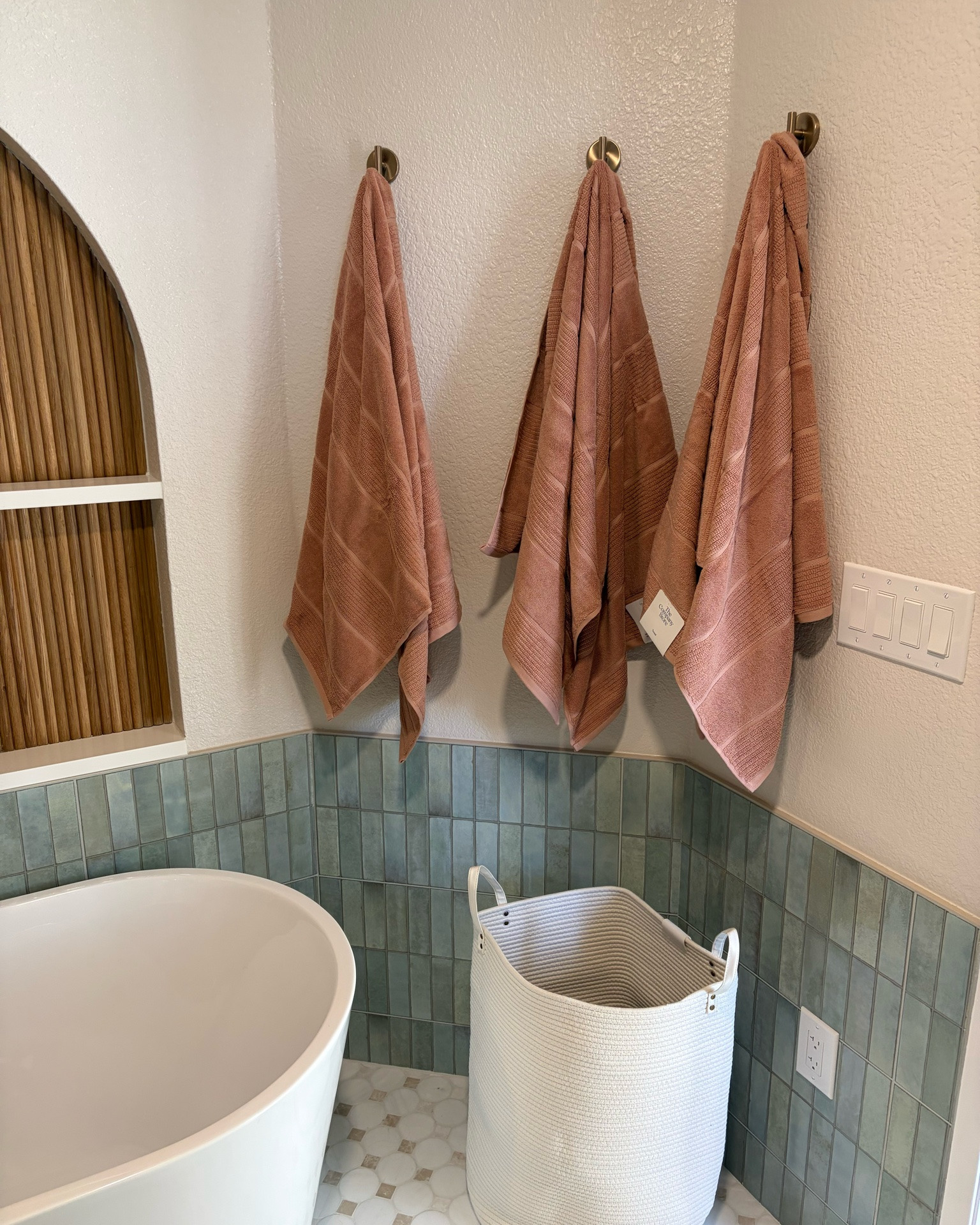 Adding the finishing touches to Kelly’s bathroom with these beautiful towels from the company store!  We decided to add some more pips of color to her bathroom with art, towels, etc rather than commit to this color long term.

#LTKHome