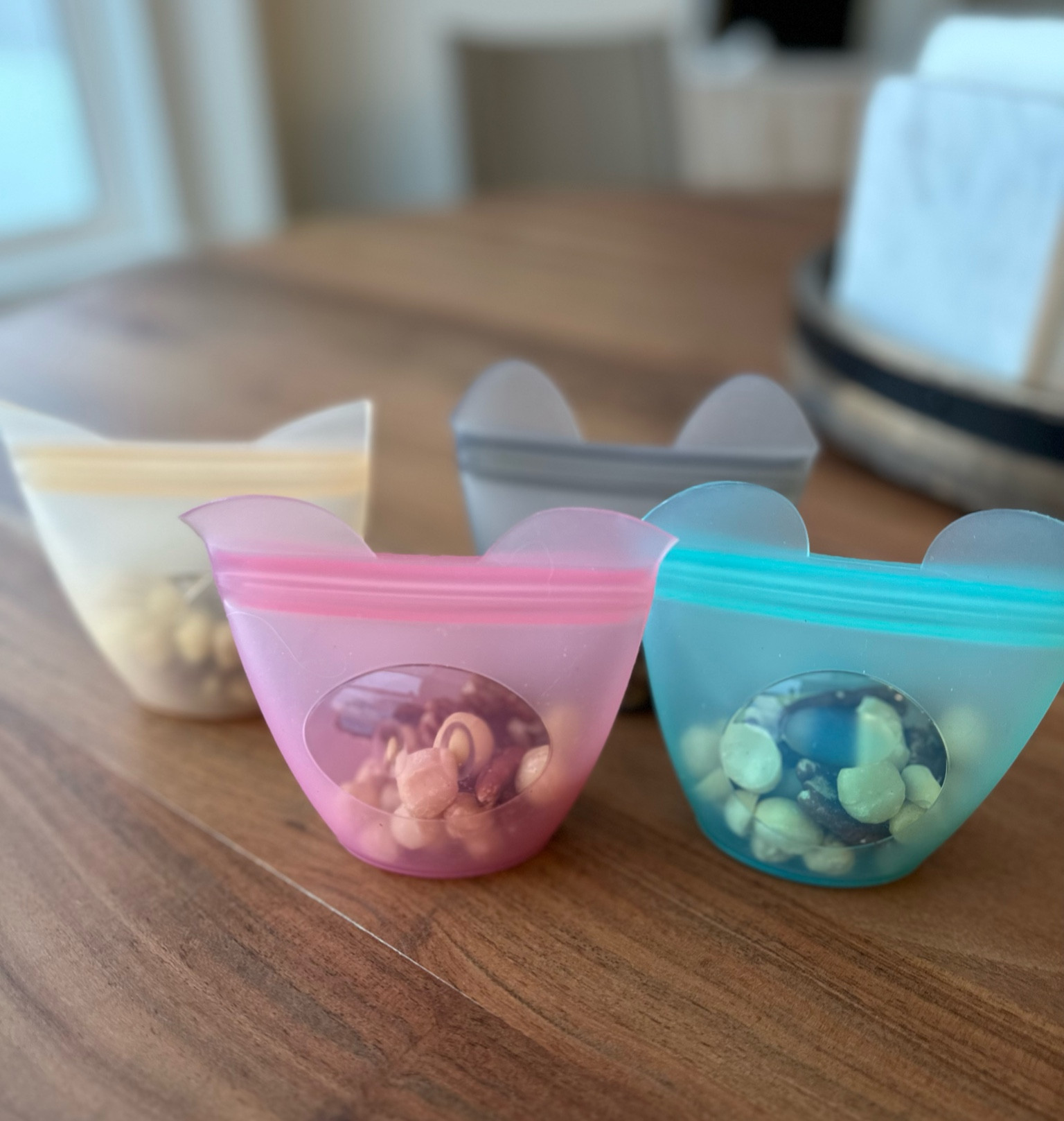 Zip top reusable 100% silicone snack containers! Perfect for school lunches, road trips, park days, flights, and more! 

#LTKFind #LTKfamily #LTKkids