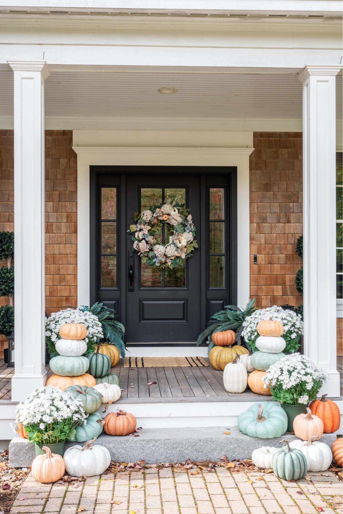 One thing I did earlier this month was decorate the porch for fall. I had grander intentions than what I accomplished (as is often the case), but I'm still pleased with the outcome. I decided to splurge over time on faux heirloom pumpkins and mums, as I'm tired of spending the money on fresh each year just for the squirrels to eat the pumpkins and for the mums to die quicker than I want them to. Here are the products I used! 

#LTKHome #LTKSeasonal