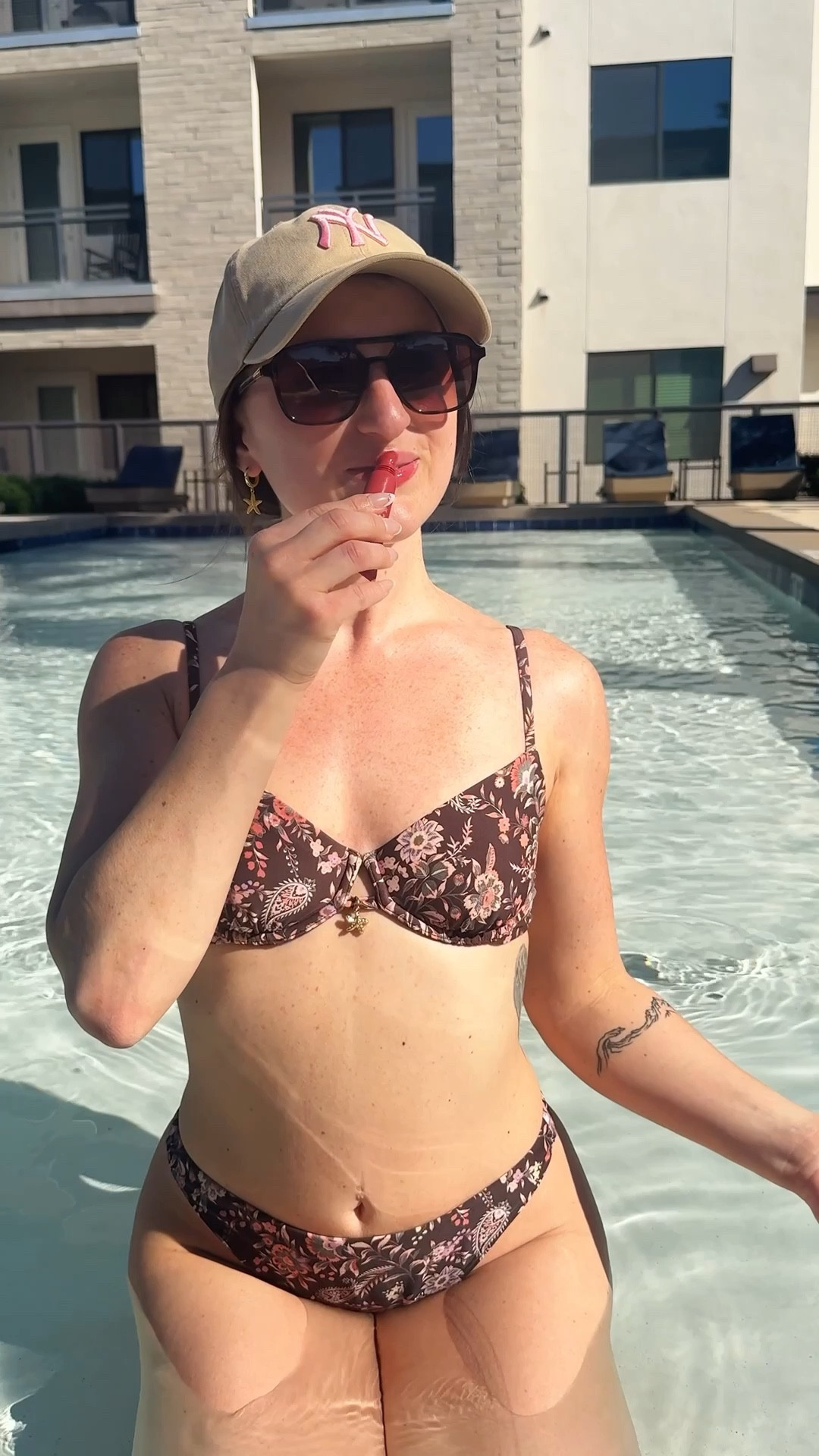 Pool day fit, but make it cute 🤎
Wearing my Abercrombie Balconette Charm Underwire Bikini Top and Mid Rise High-Leg Moderate Bottom in Brown Paisley — supportive, flattering, and perfect for lounging by the pool. Paired it with my ’47 New York Yankees cap from Anthropologie and my Cay Skin SPF lip balm in Iris Rose for sun protection with a glossy finish. Everything’s linked on LTK ✨

#LTKootd #LTKgrwm #LTKdayinmylife