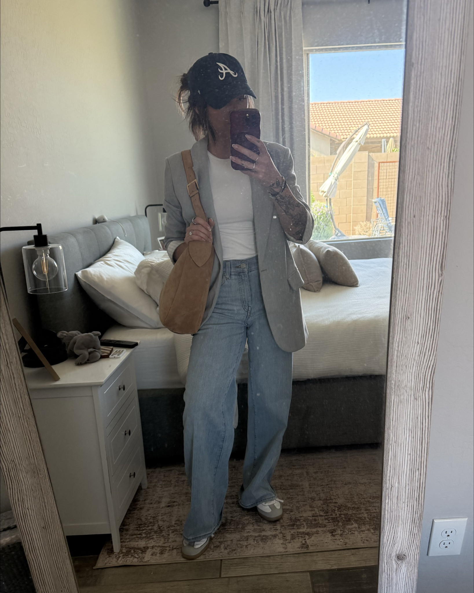 Hair wash day 🤝 cute outfit. Loving these FRAME jeans. The fit is so flattering, the wash goes with everything, and they have that effortless relaxed vibe while still making you feel put together. Added my favorite cap to hide the chaos that is my hair and called it a look. 

#LTKSeasonal #LTKootd #LTKWorkwear
