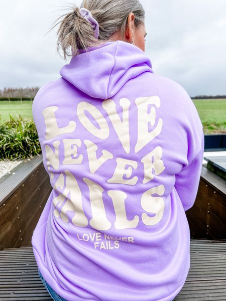 Love never fails. Graphic print lavender hooded sweater. Fits roomy but the sleeves are a tad bit short so size up if you need longer length. 



#LTKunder50 #LTKeurope #LTKstyletip
